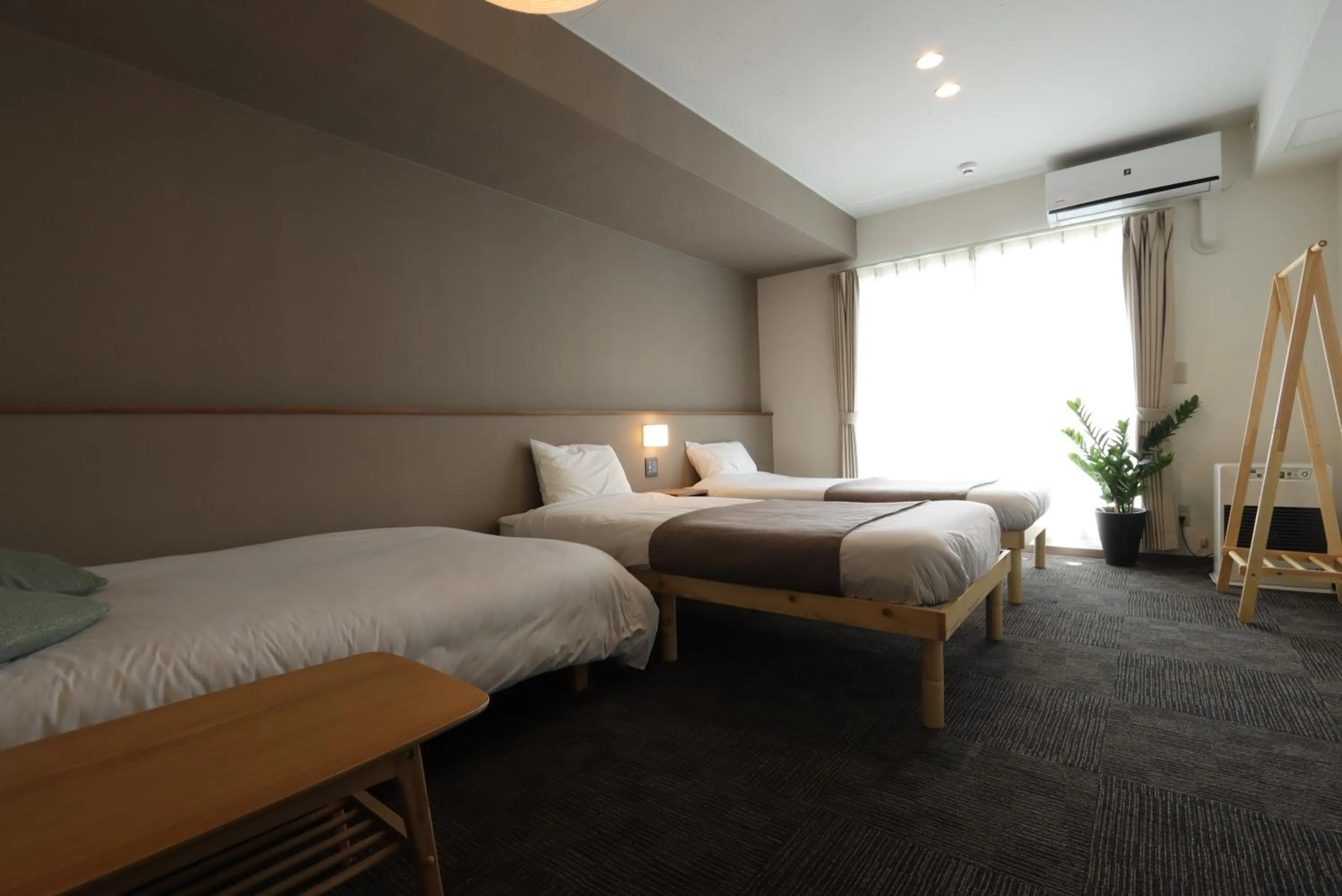 Photo of the whole room, Bed in UCHI Living Stay Otaru Suitengu