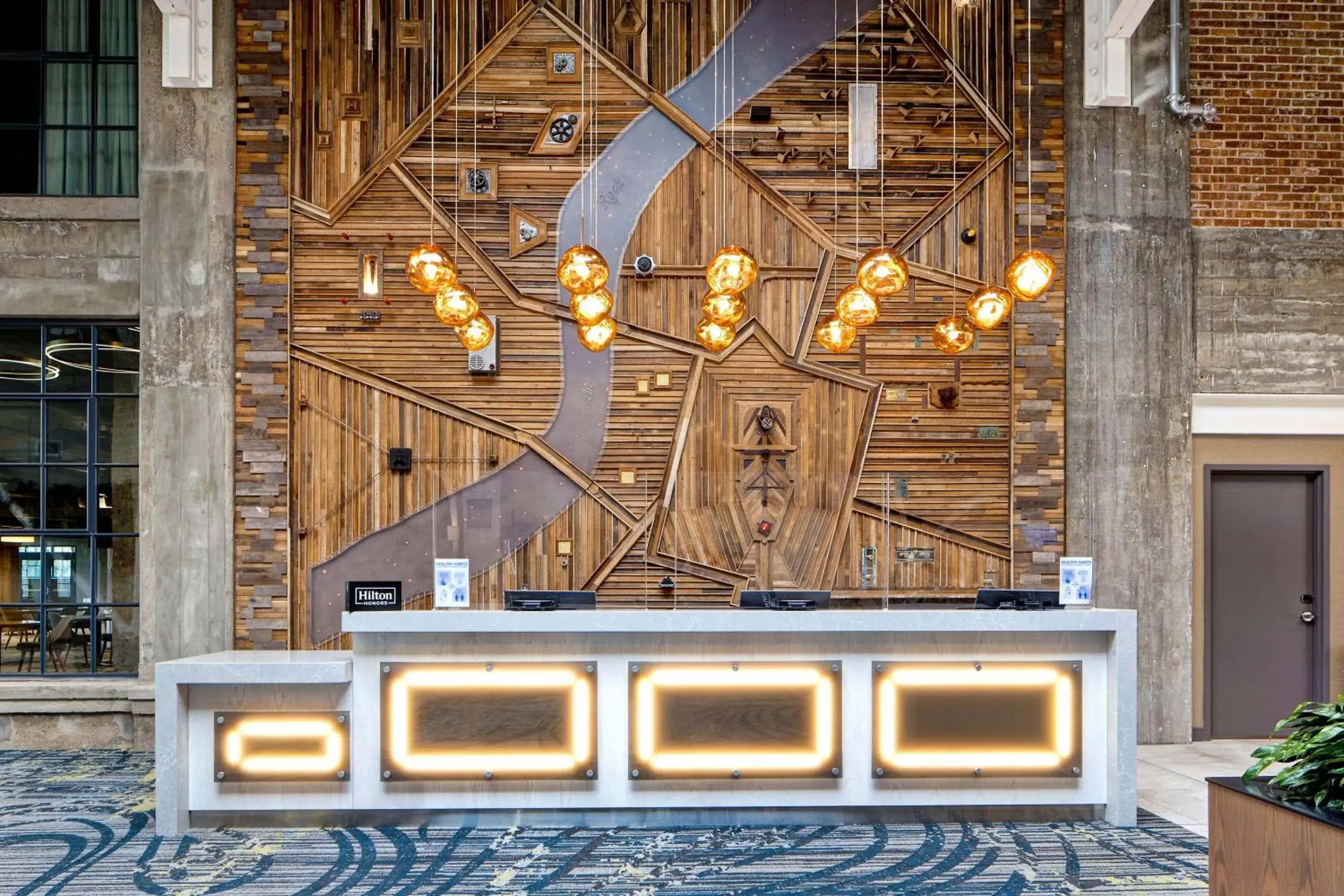 Lobby or reception in Embassy Suites By Hilton Rockford Riverfront Lobby or reception in Embassy Suites By Hilton Rockford Riverfront