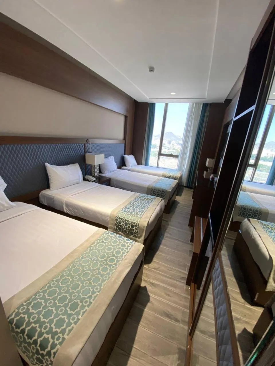 Bed in Violet Al Shisha Hotel