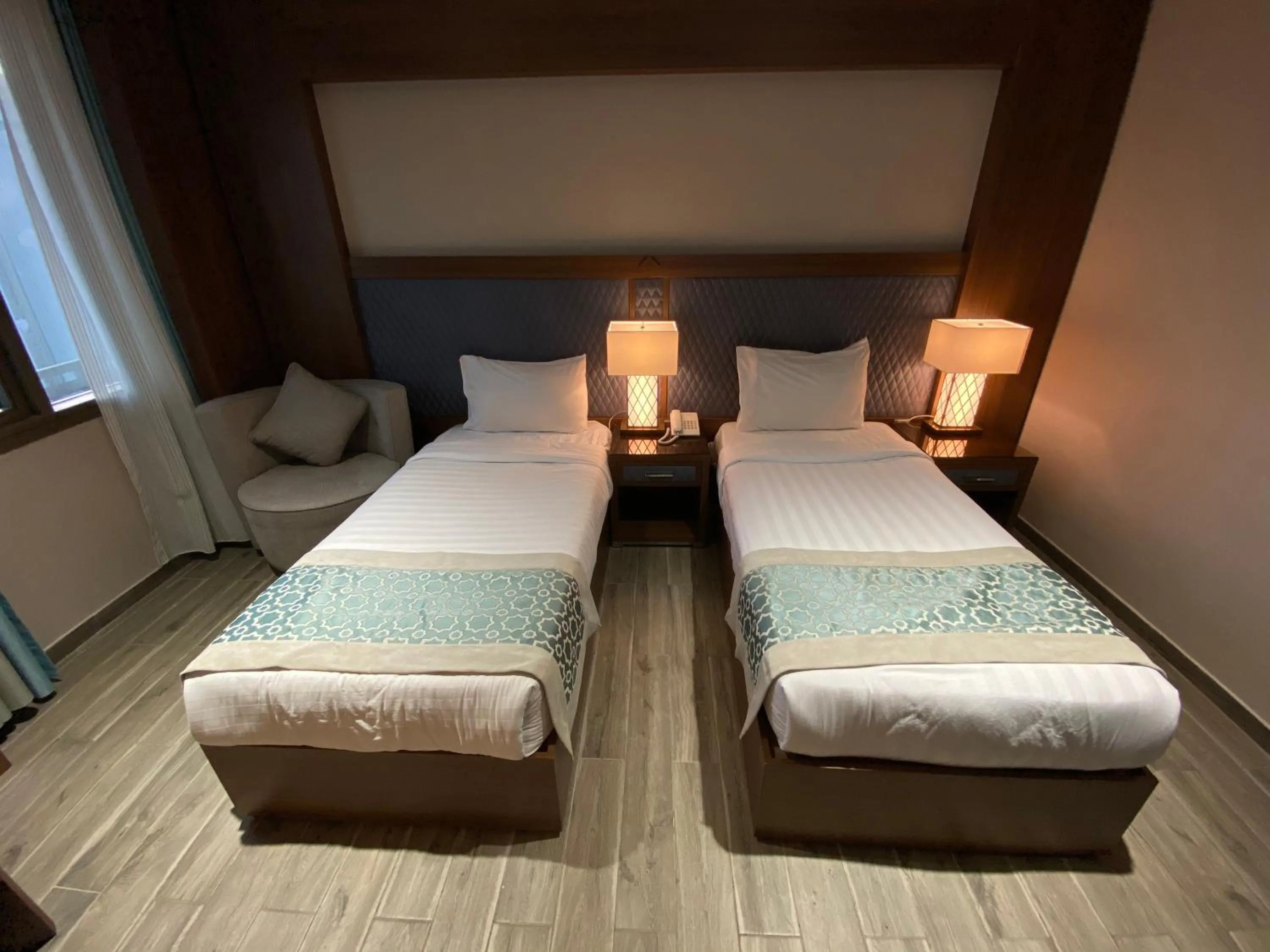 Bed in Violet Al Shisha Hotel