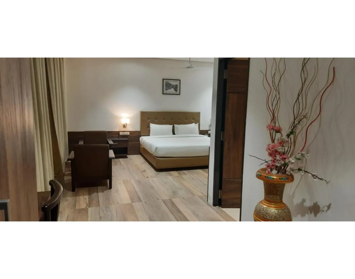 Photo of the whole room, Bed in The Byke Suraj Club, Junagadh