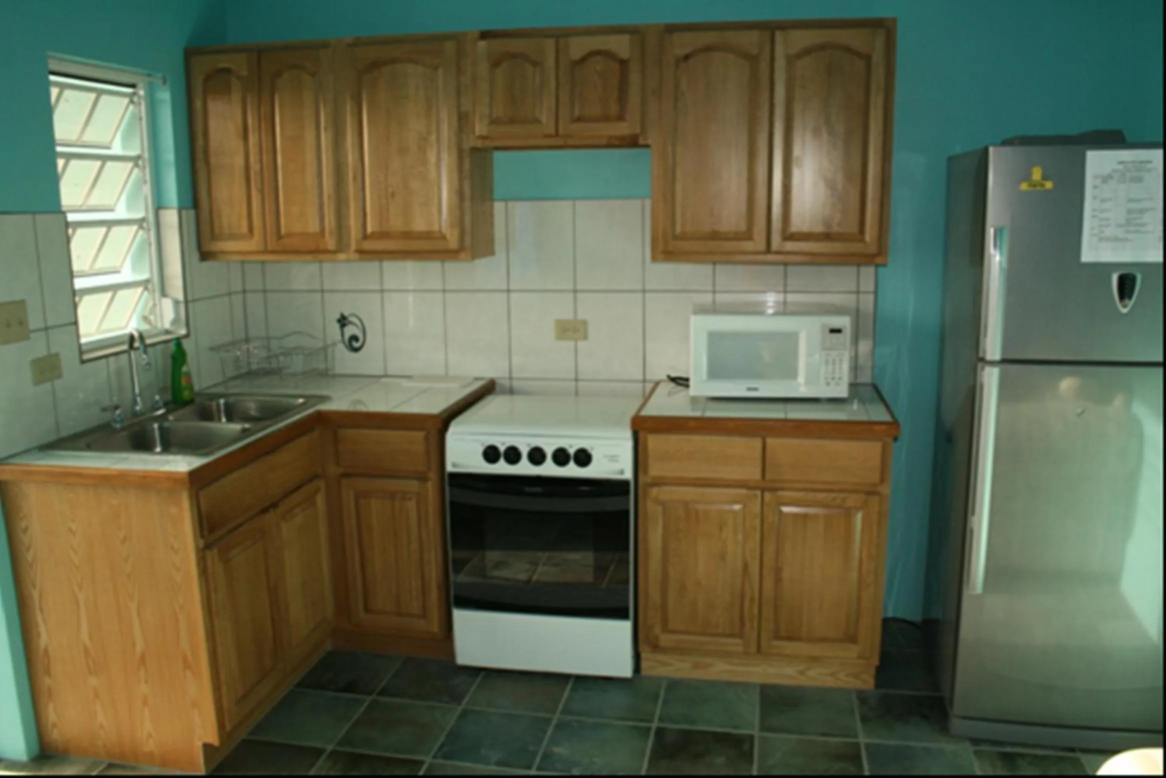 Kitchen or kitchenette in Lamblion Holiday Apartment