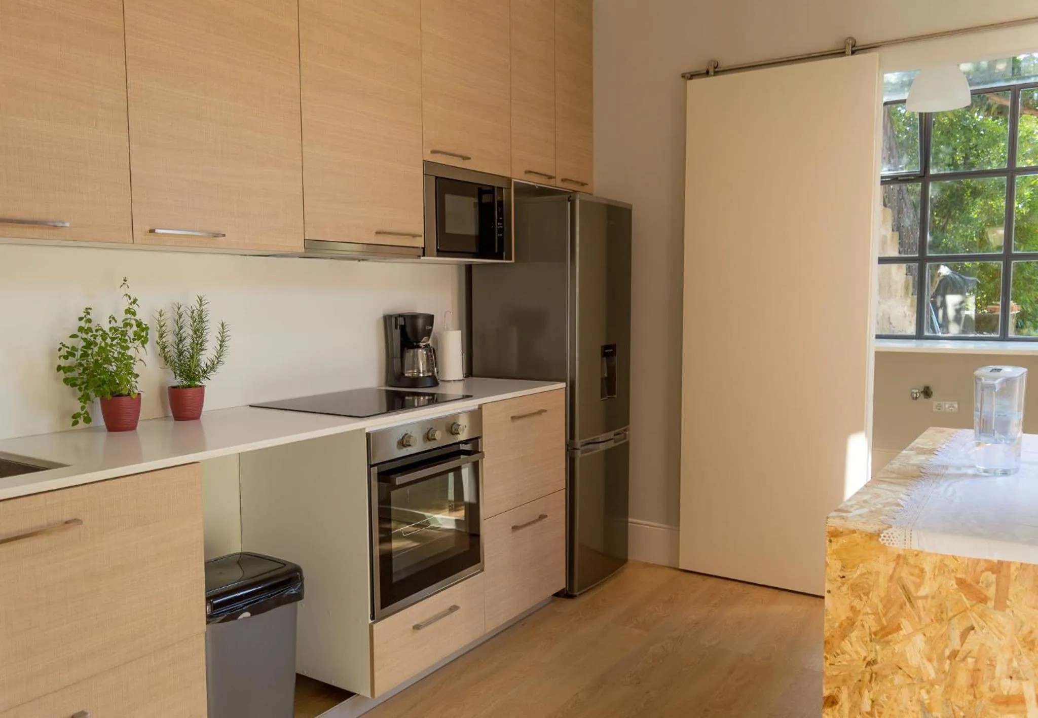 Kitchen or kitchenette in Queen's Garden Hostel