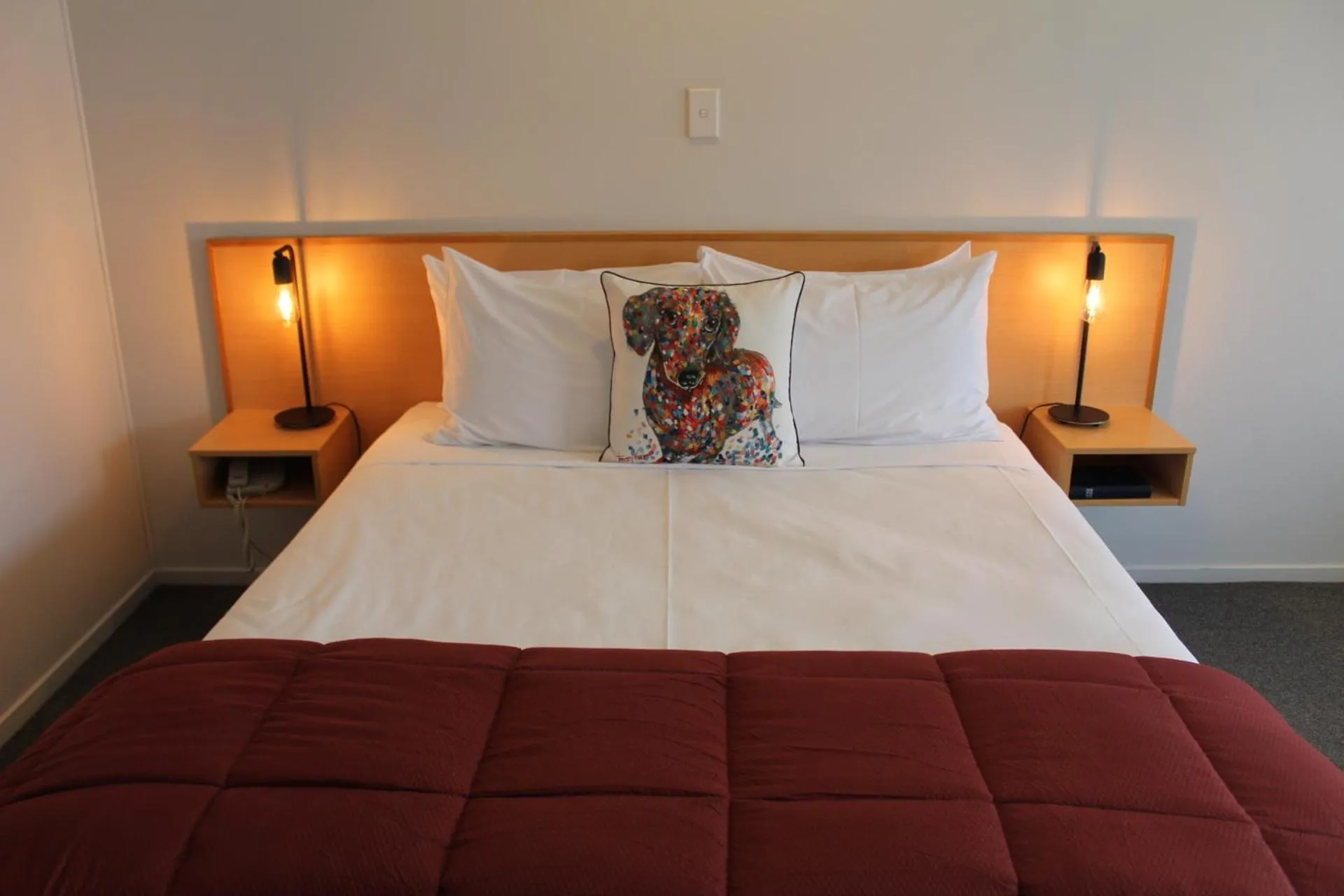 Bed in ASURE Kaimai View Motel