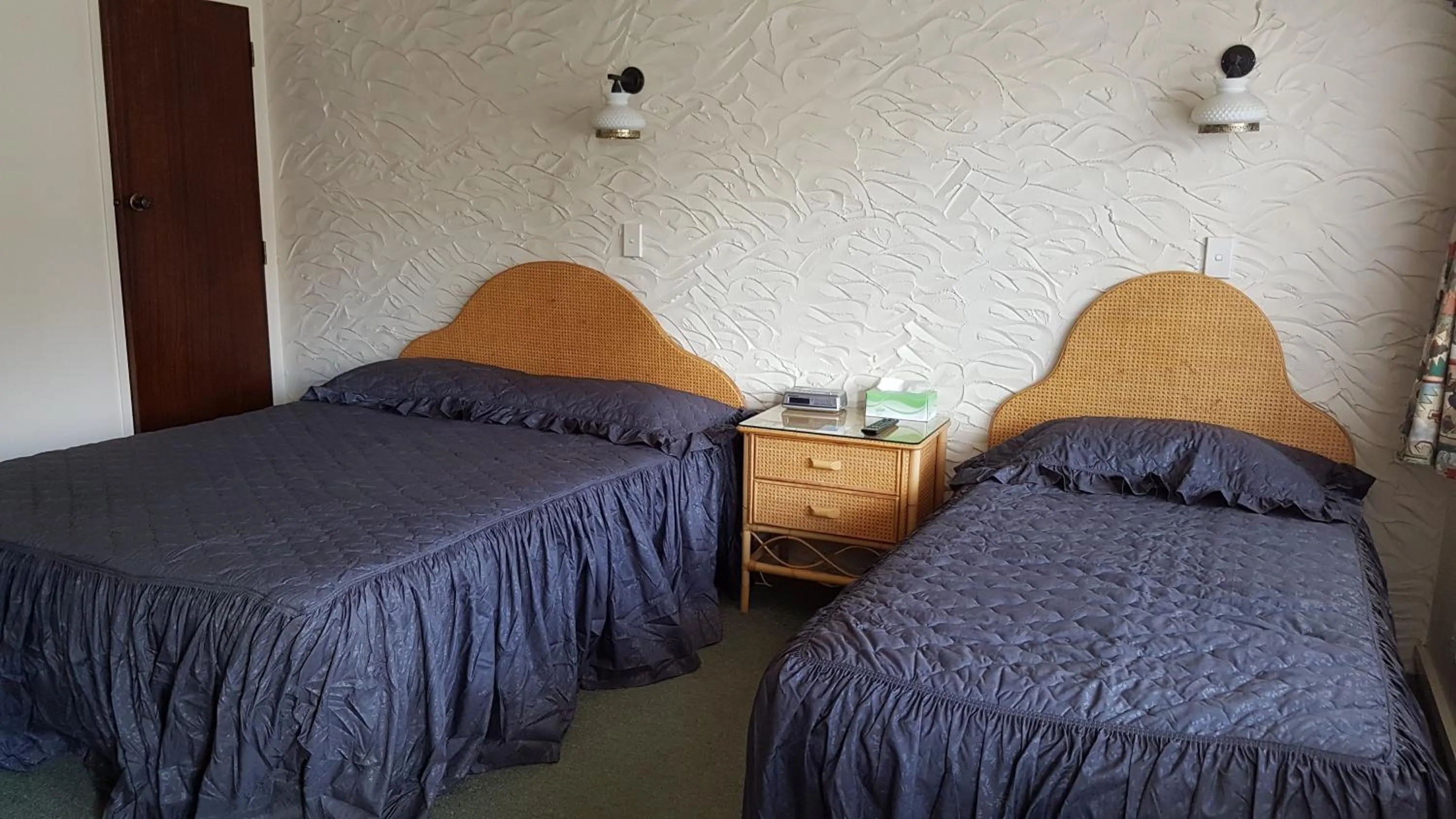 Bed in Coachman Motel