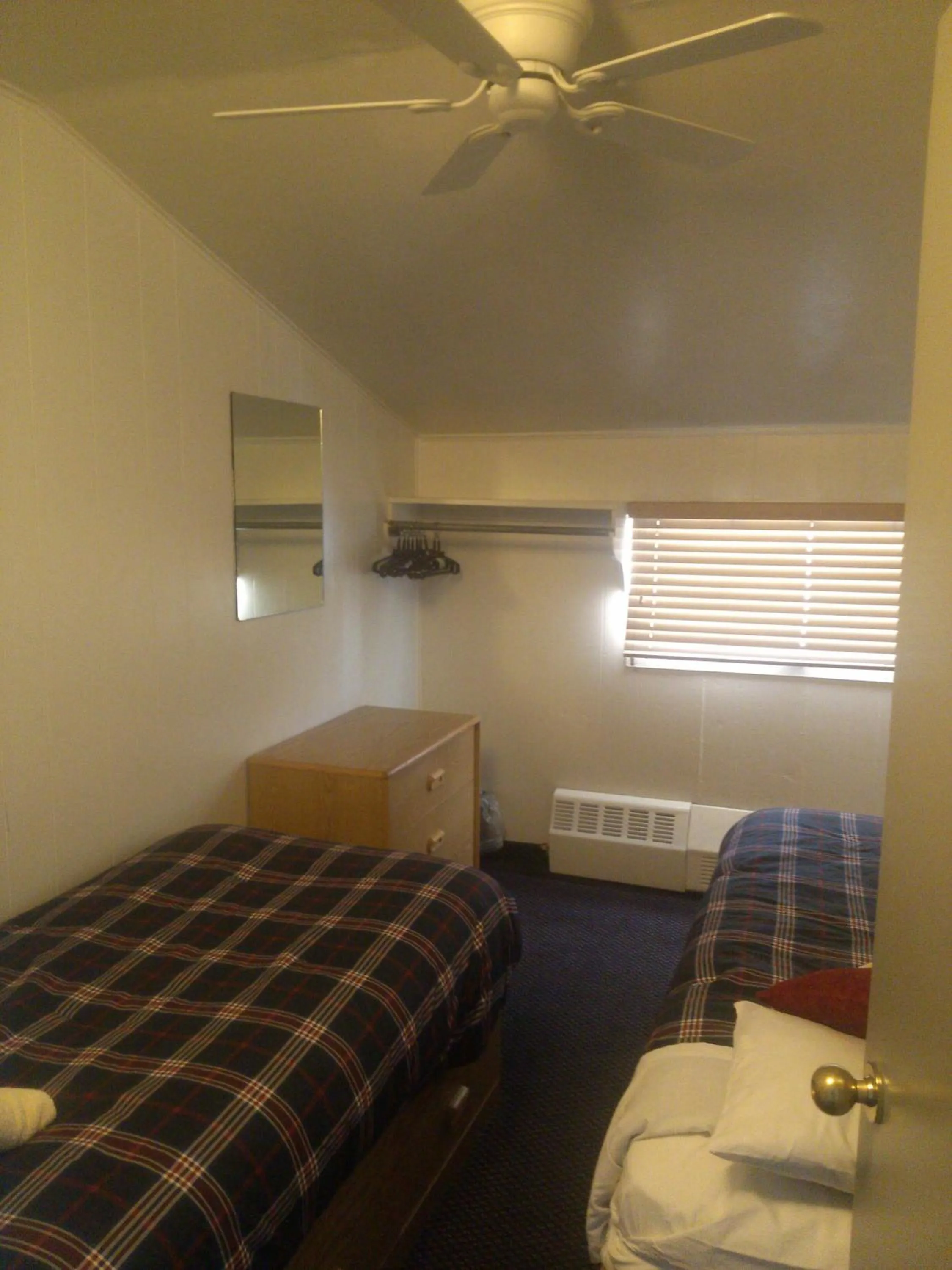 Photo of the whole room, Bed in St Moritz Lodge and Condominiums