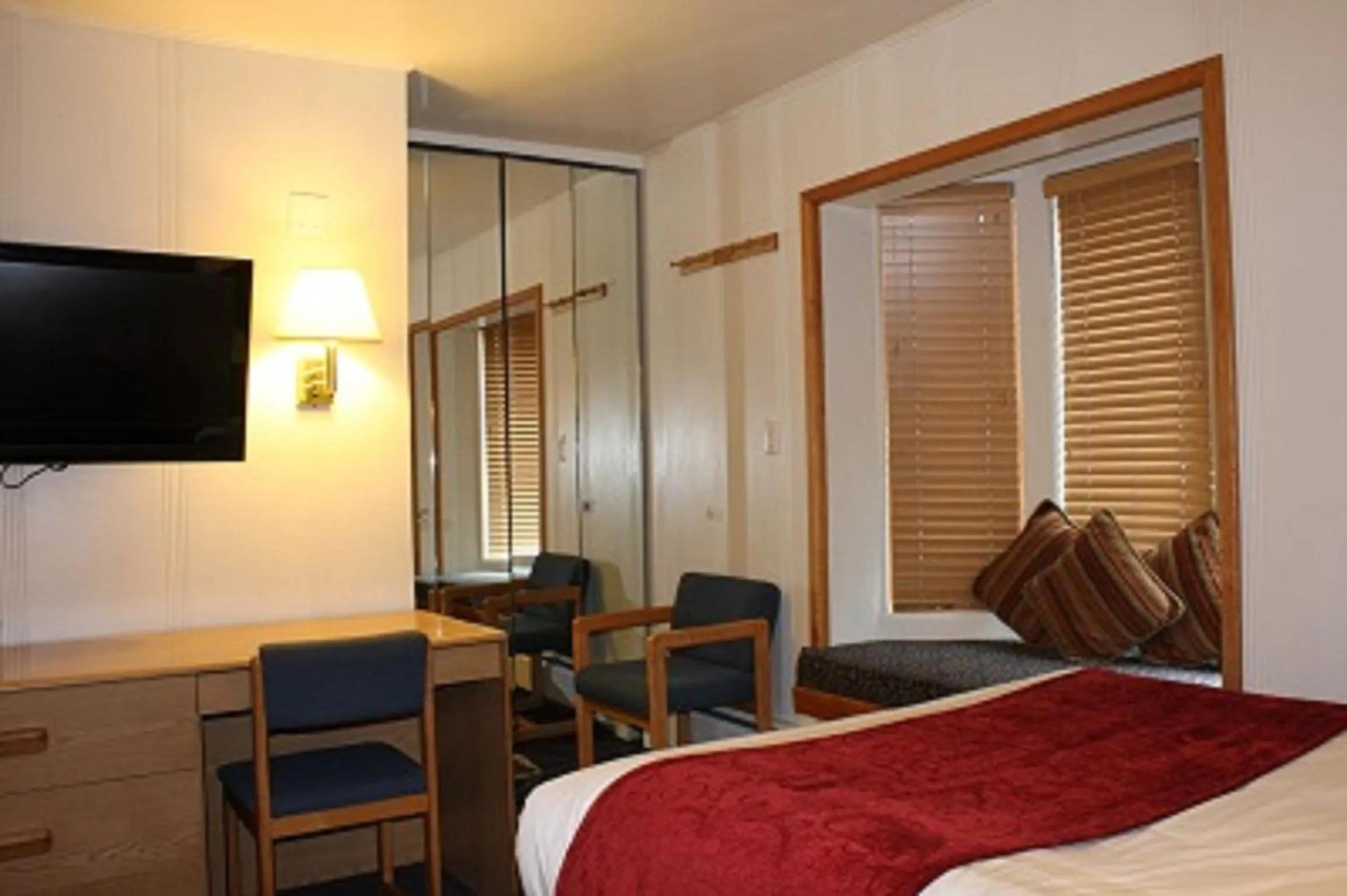 Photo of the whole room, Bed in St Moritz Lodge and Condominiums