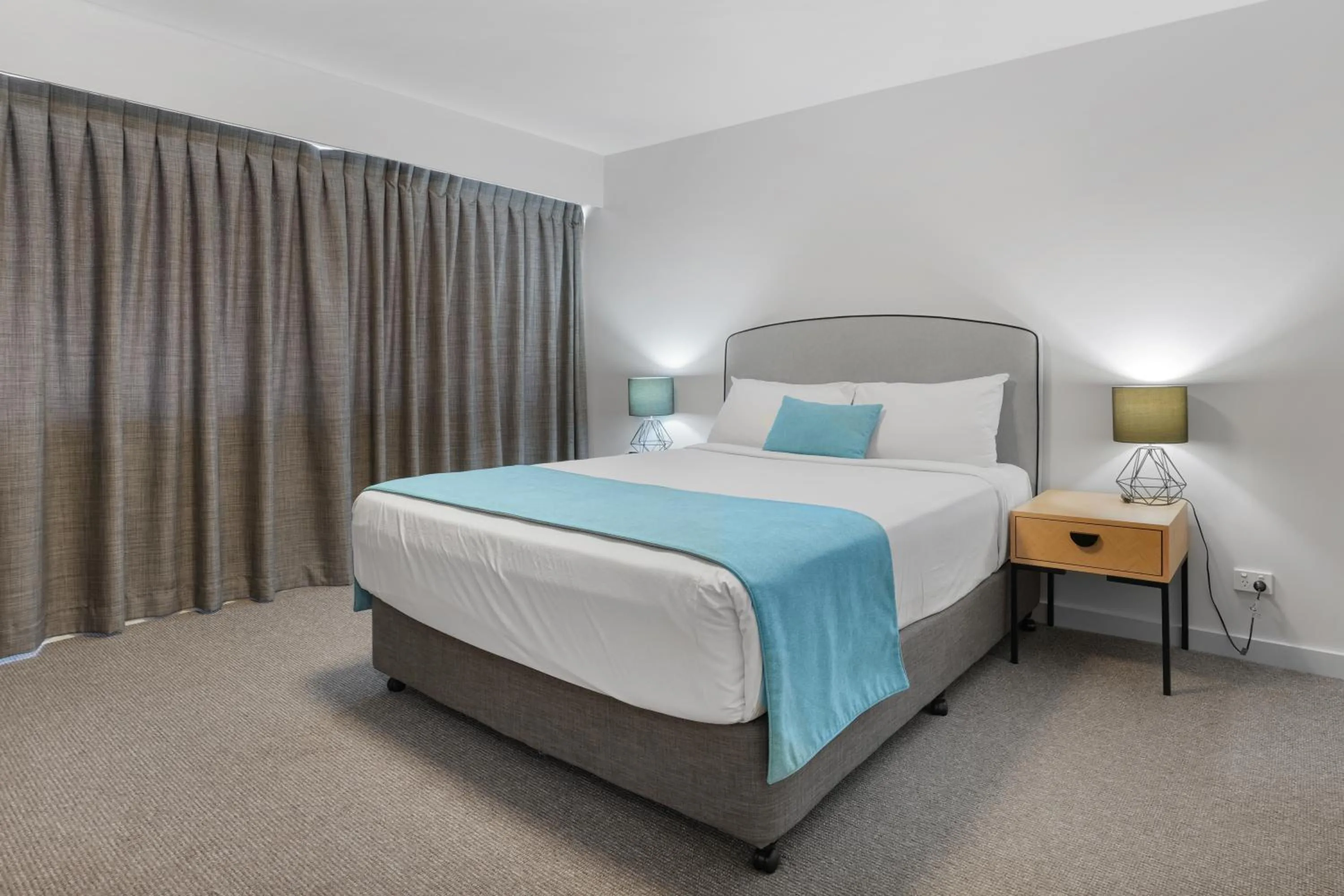 Bed in Gladstone Reef Hotel Motel