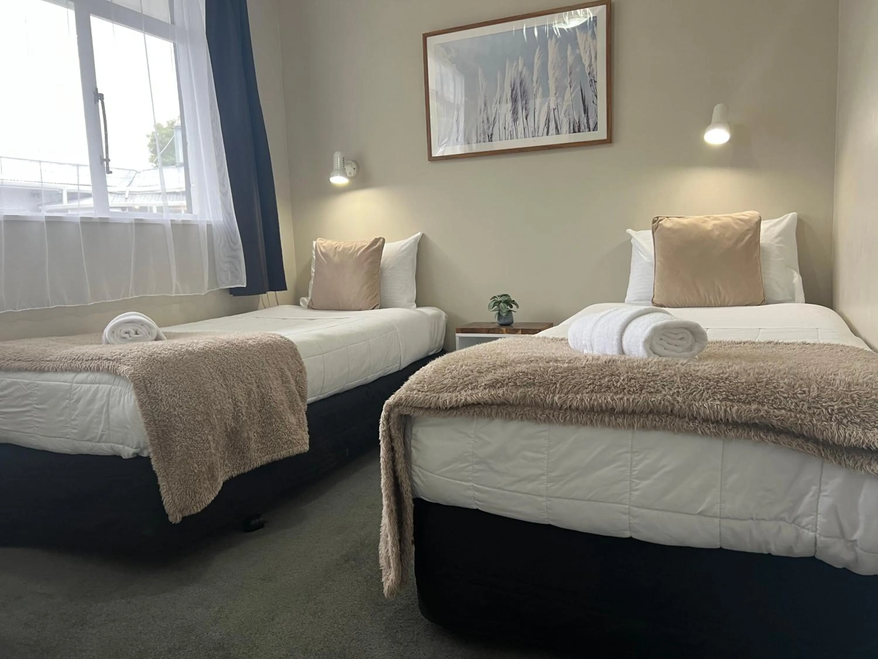 Bed in High Street Living Motel