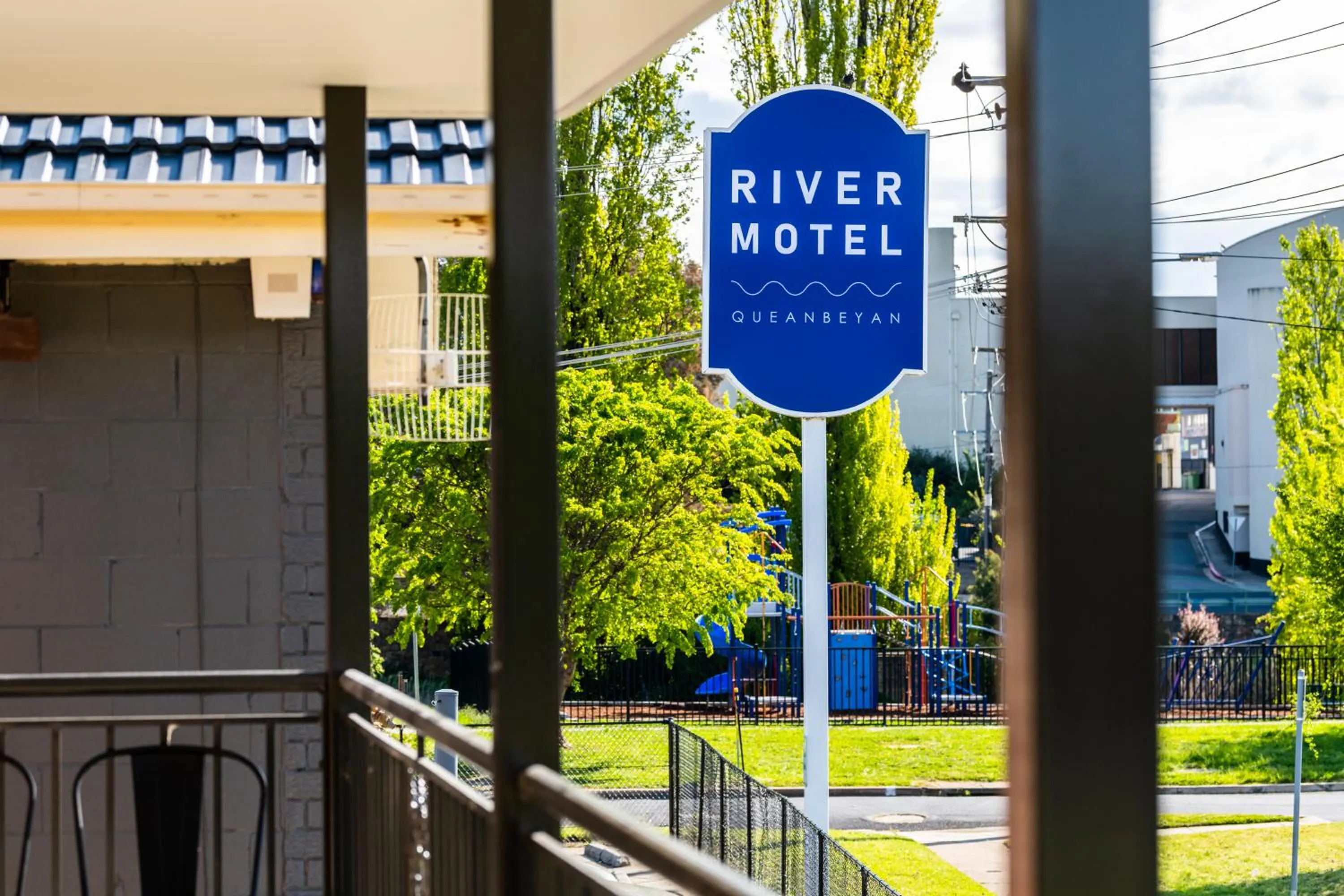 Property logo or sign in River Motel