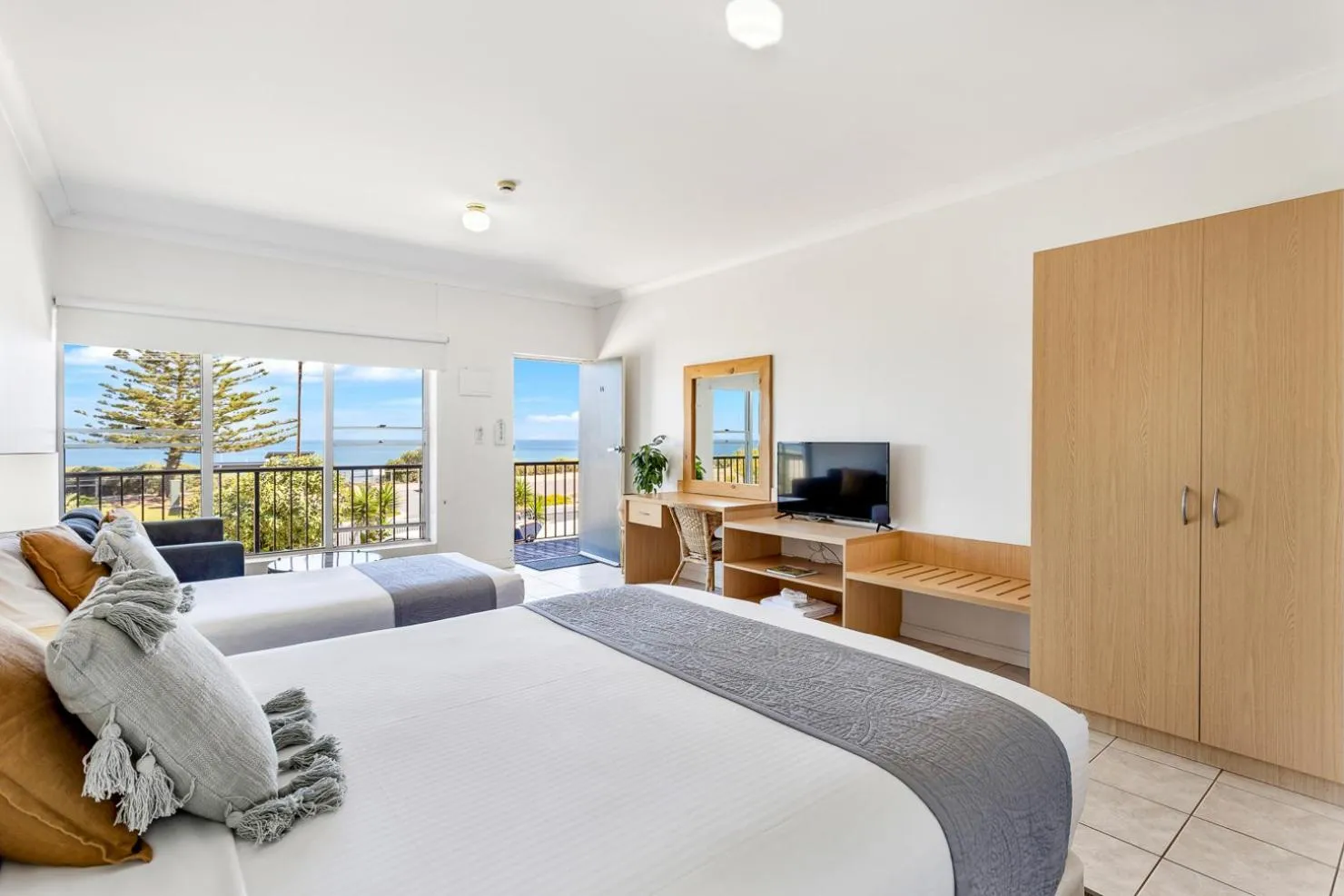 Bed in Coast Motel and Apartments