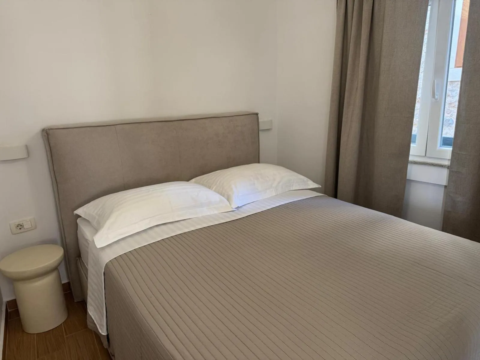 Bed in Apartments Nina