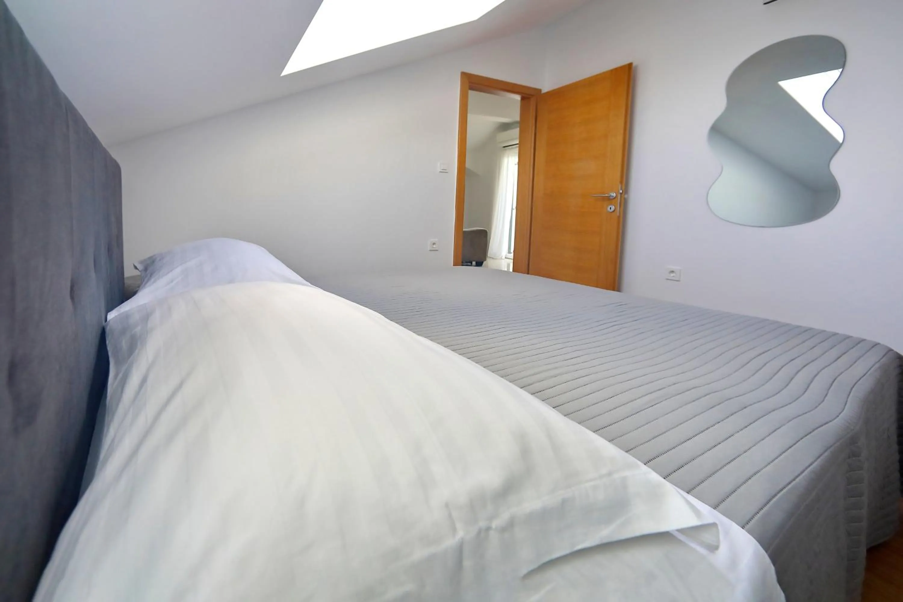 Bed in Apartments Nina
