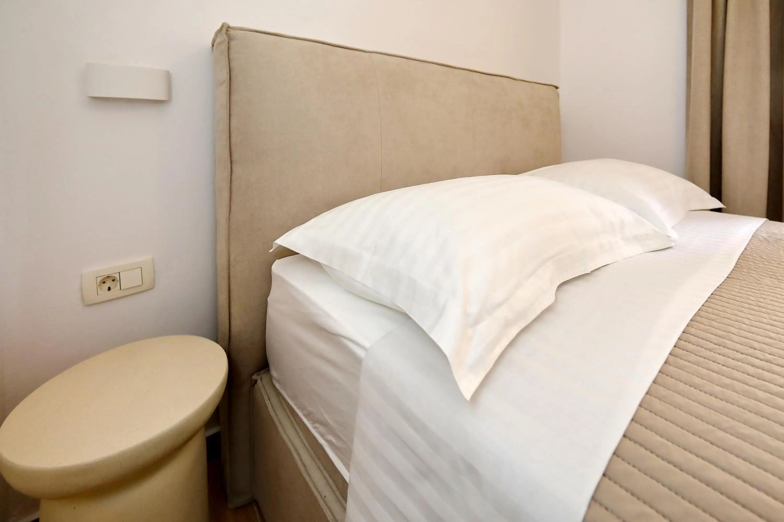 Bed in Apartments Nina