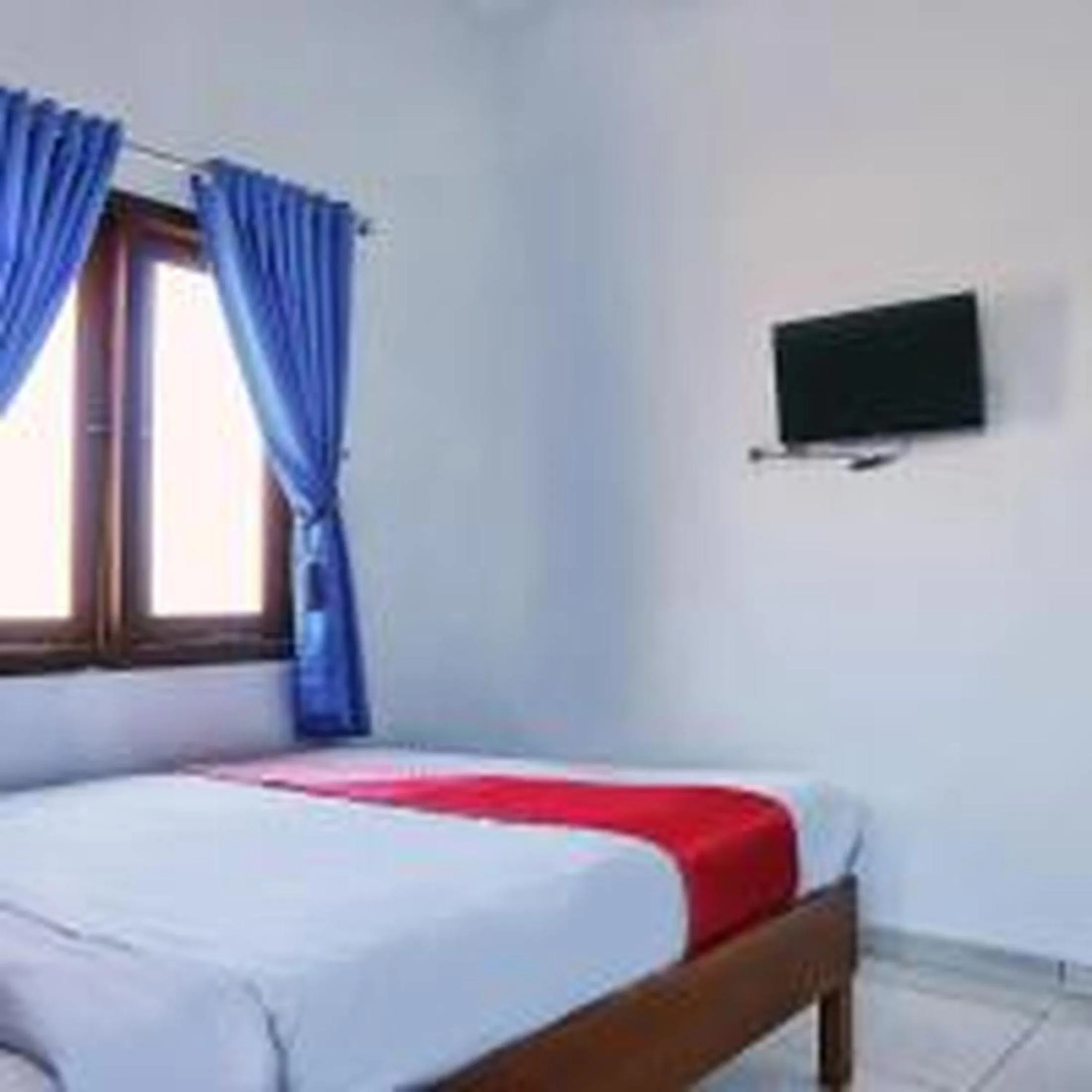 Bed in Hotel O Homiko