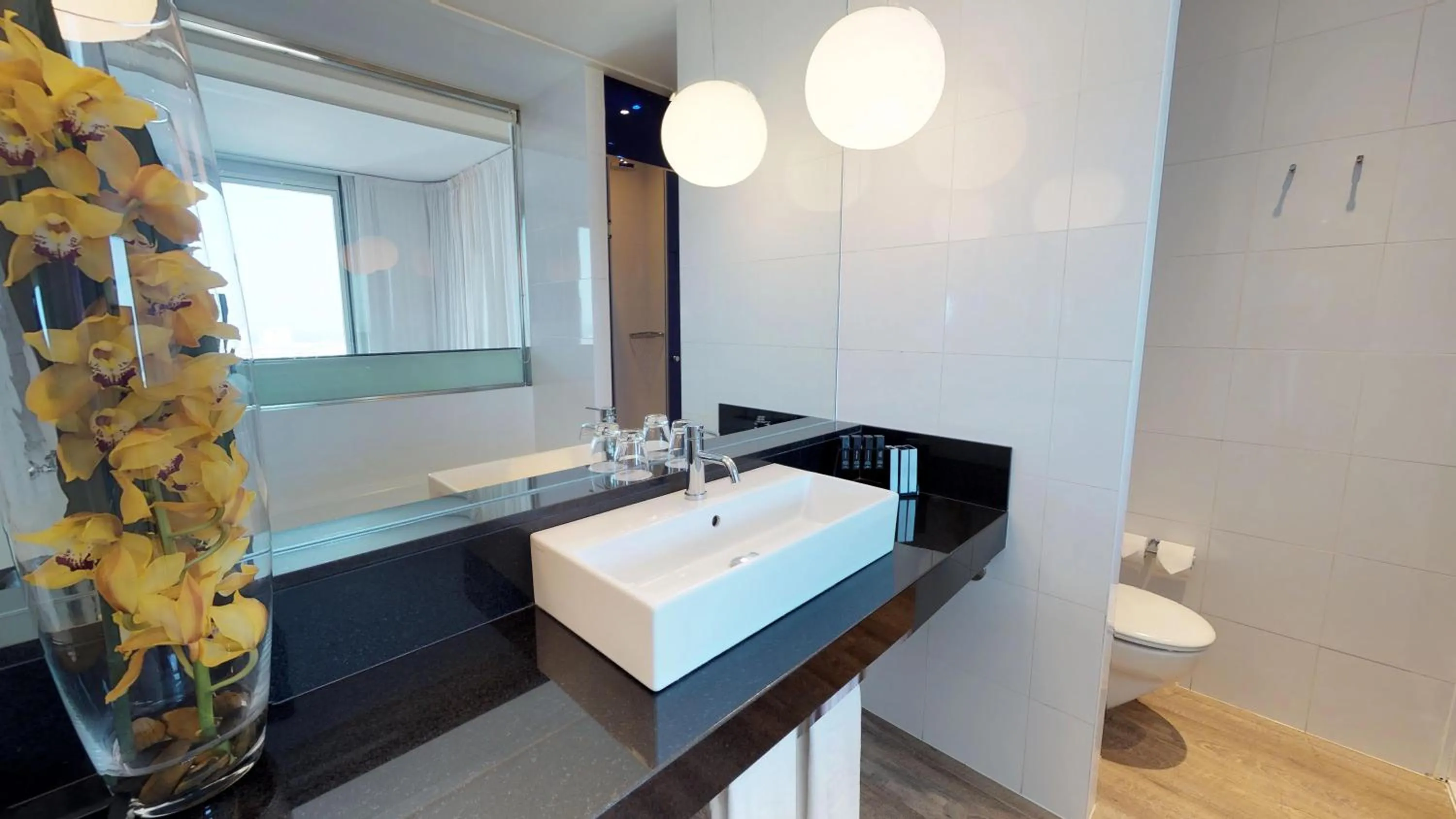 Bathroom in The Level at Melia Barcelona Sky