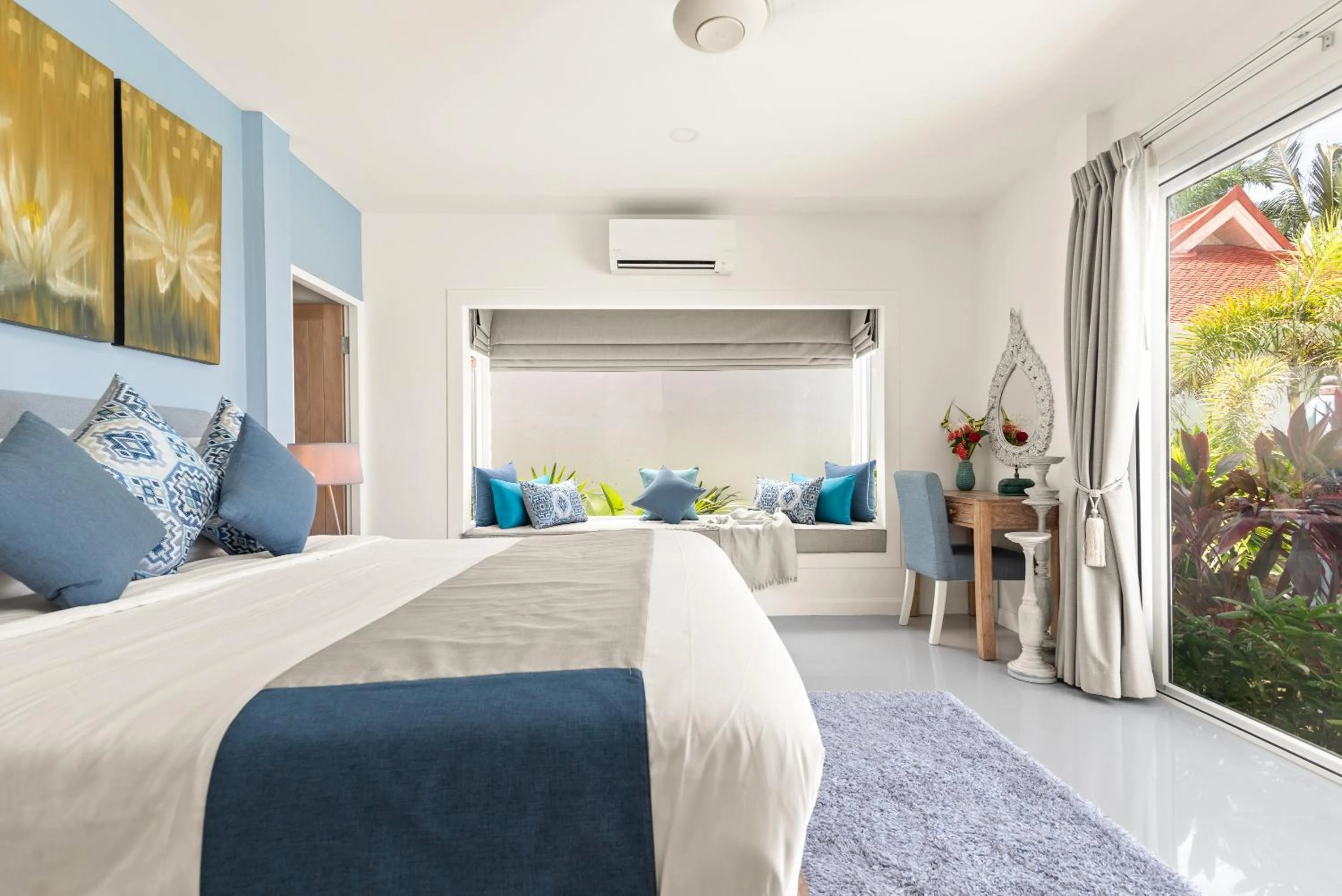 Bed in Beachfront Villa Baan Rim Haad 3BR