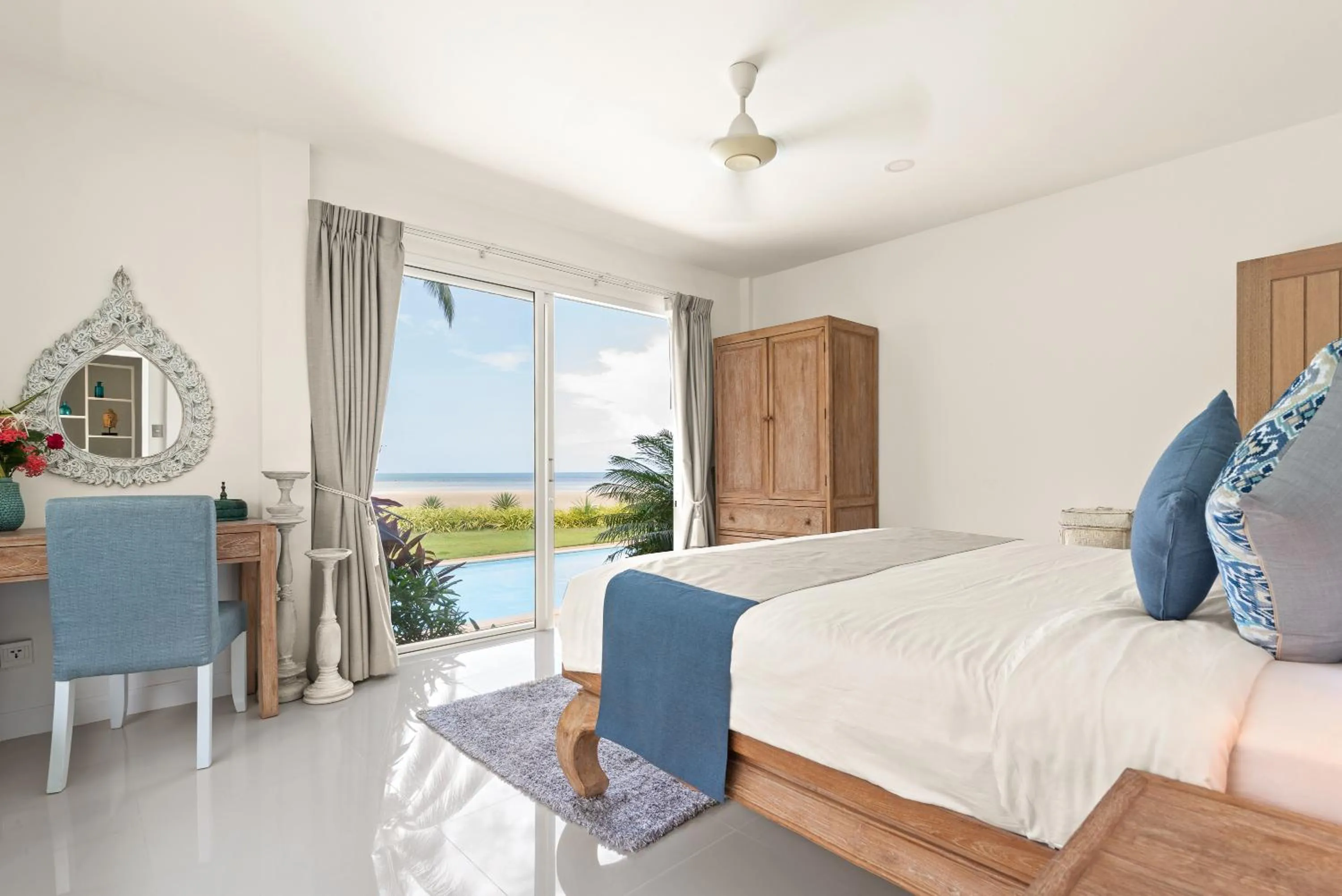 Bed in Beachfront Villa Baan Rim Haad 3BR