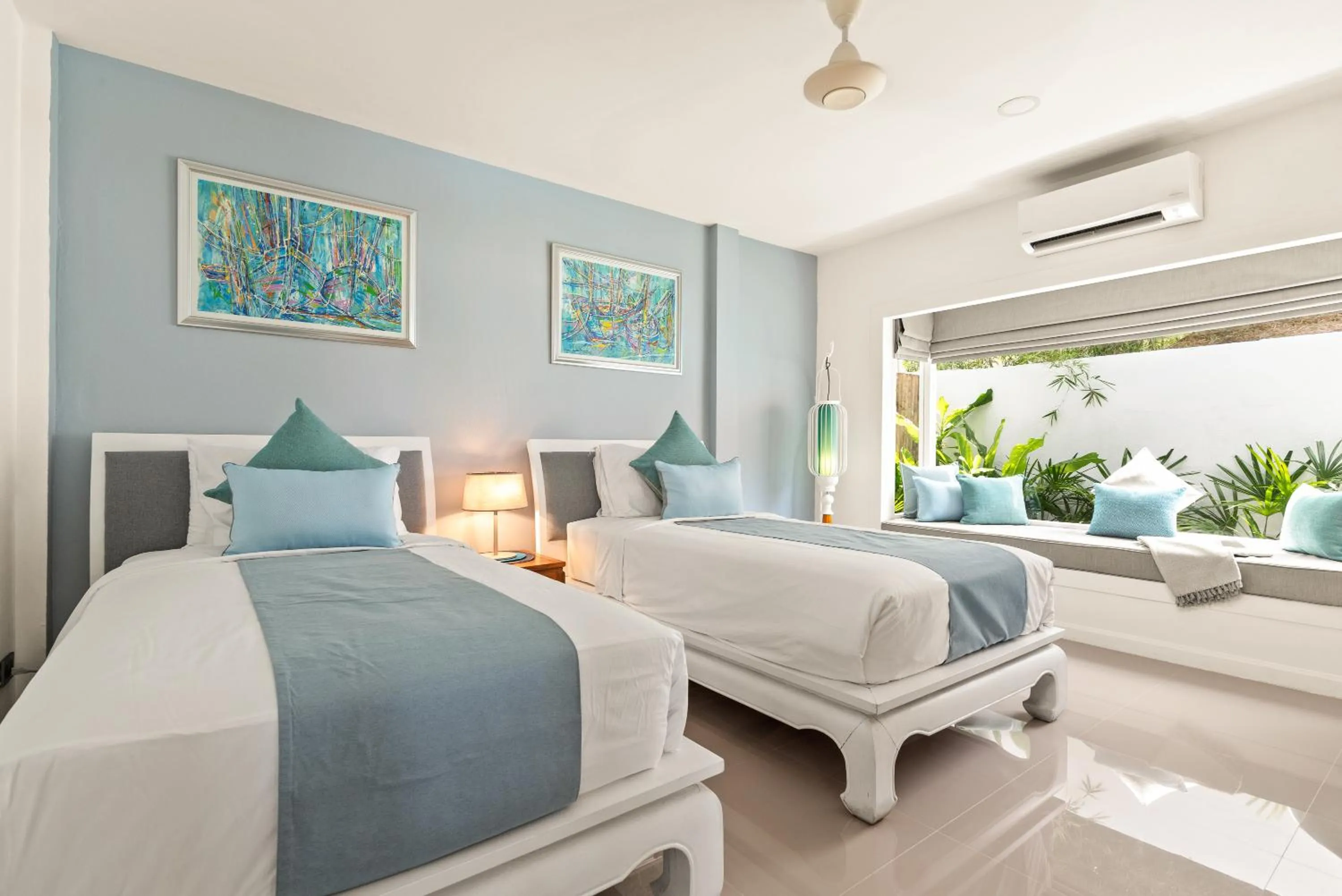 Bed in Beachfront Villa Baan Rim Haad 3BR