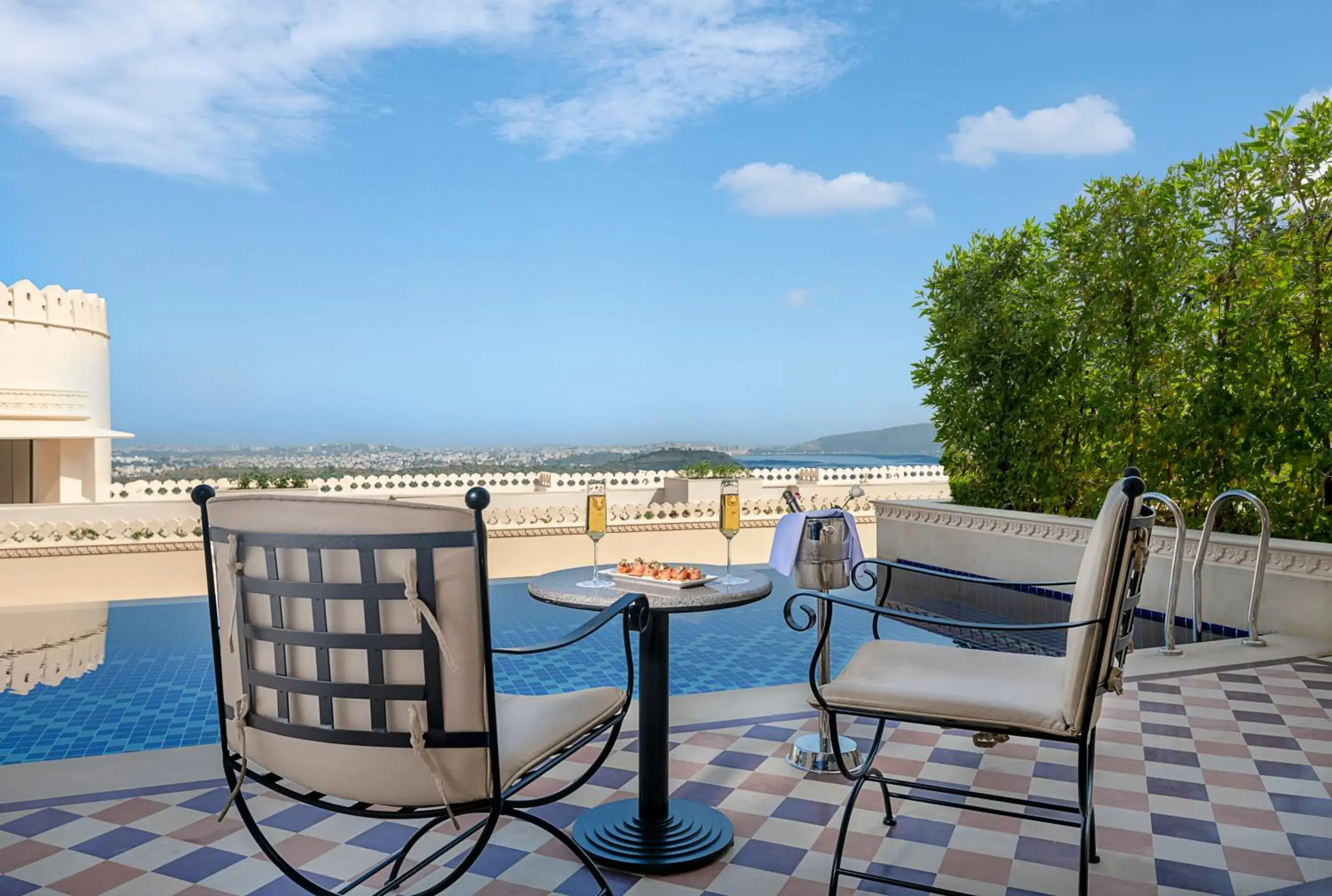 Swimming pool in Aurika, Udaipur - Luxury by Lemon Tree Hotels Swimming pool in Aurika, Udaipur - Luxury by Lemon Tree Hotels