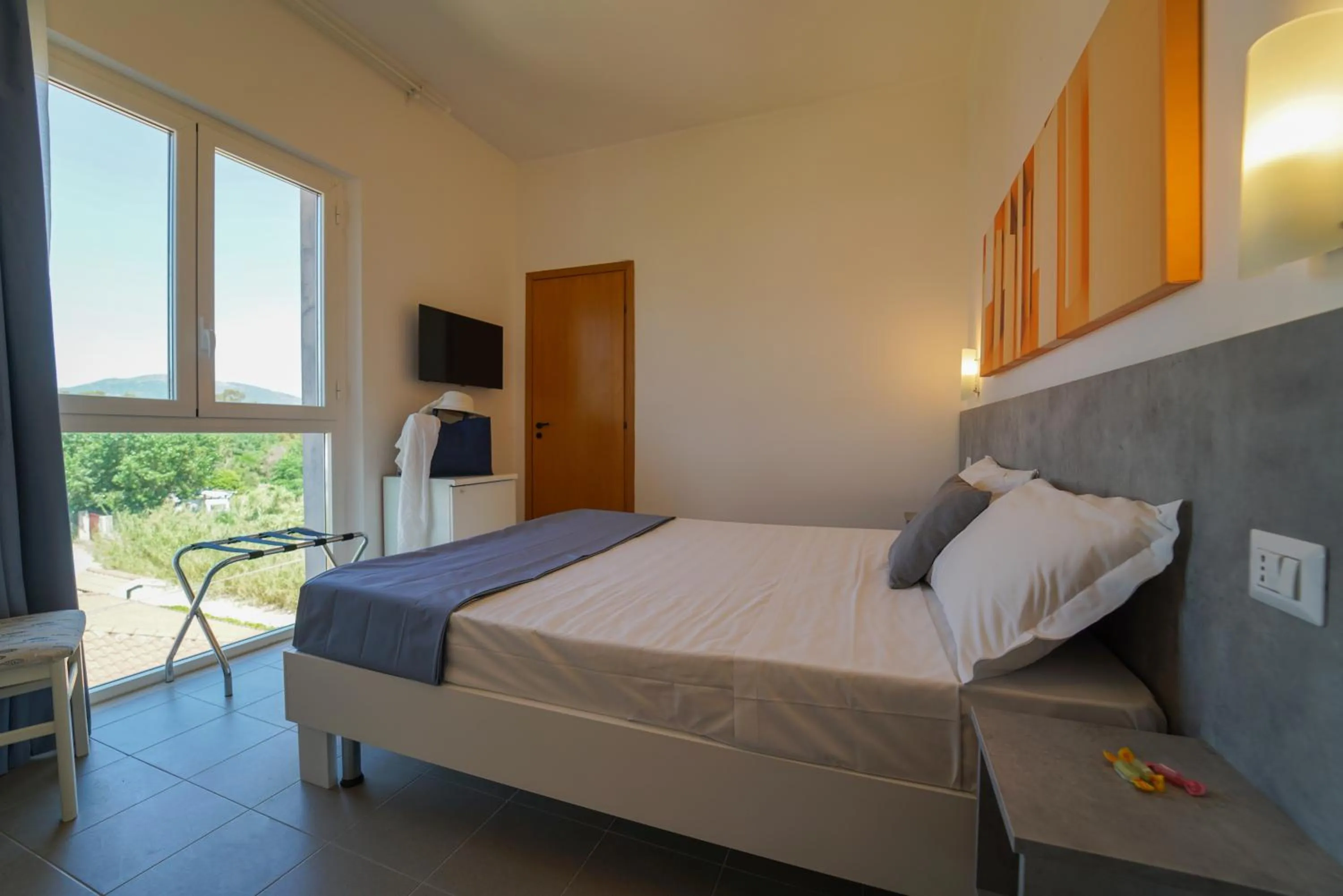 Bed in Hotel Rivabella