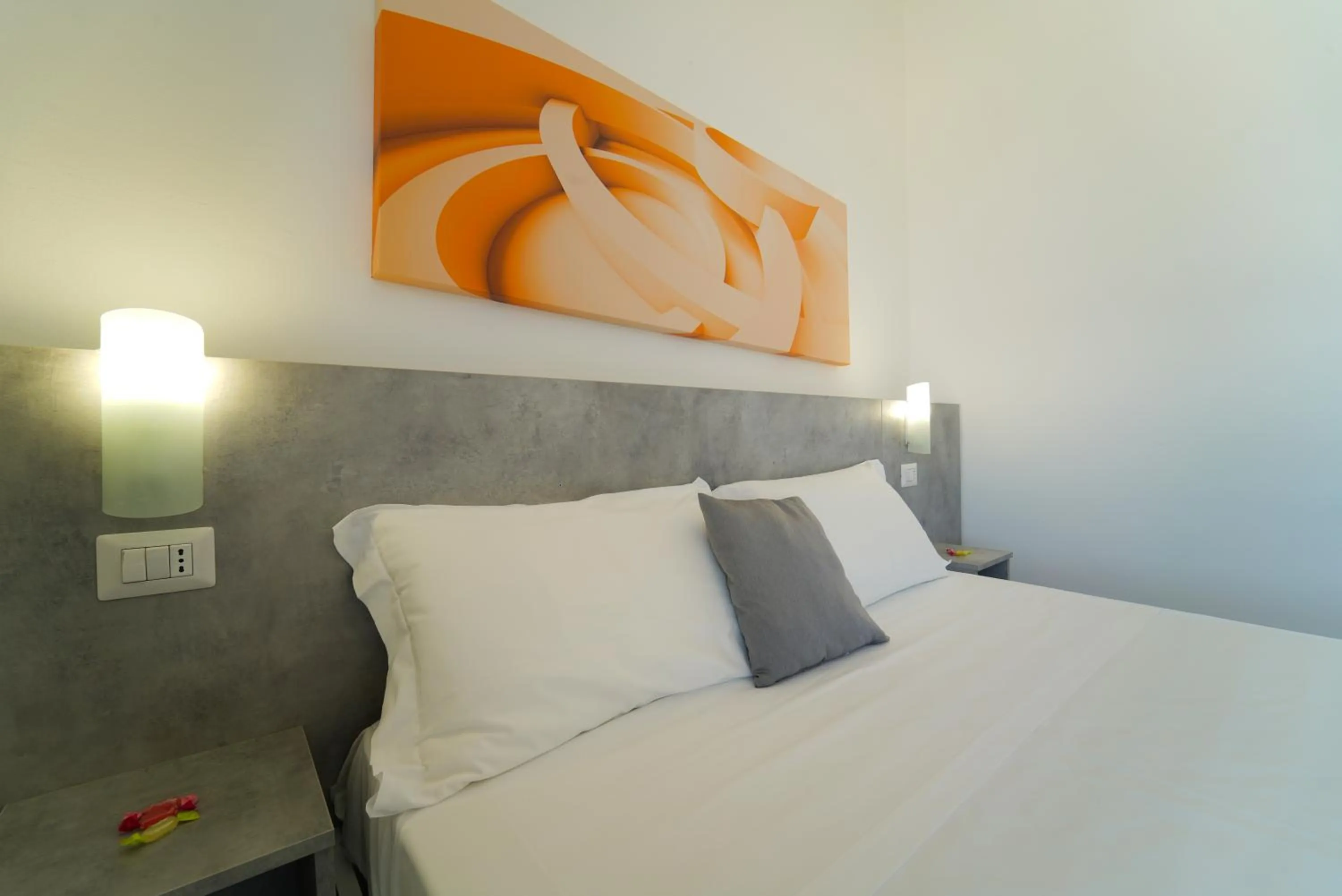 Bed in Hotel Rivabella