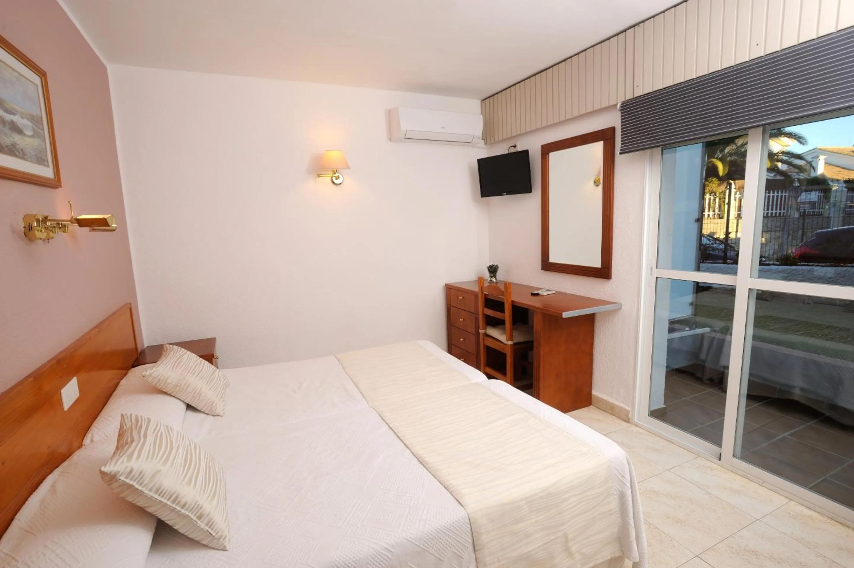 Bed in Hotel Complejo Los Rosales