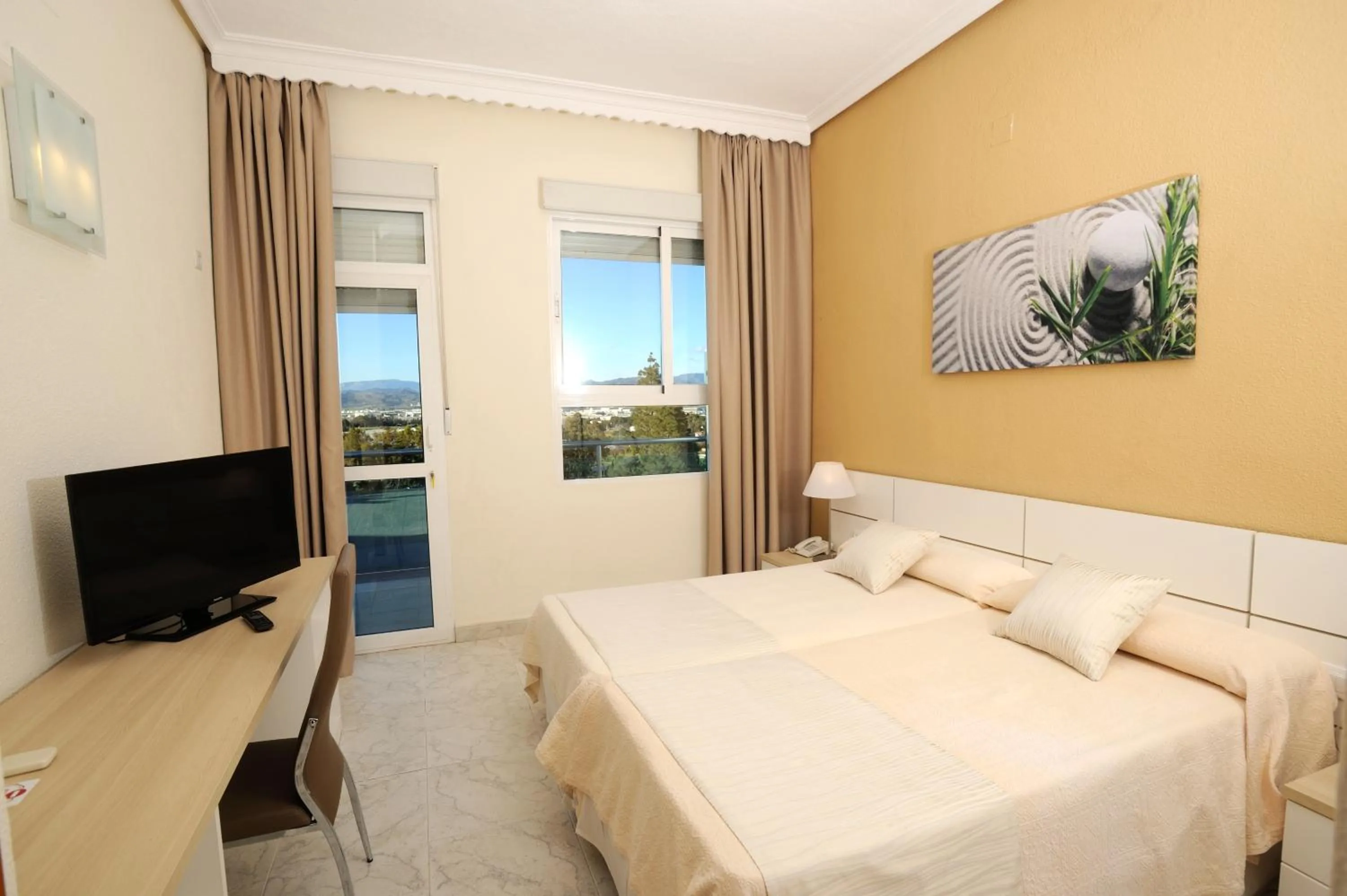 Bed in Hotel Complejo Los Rosales