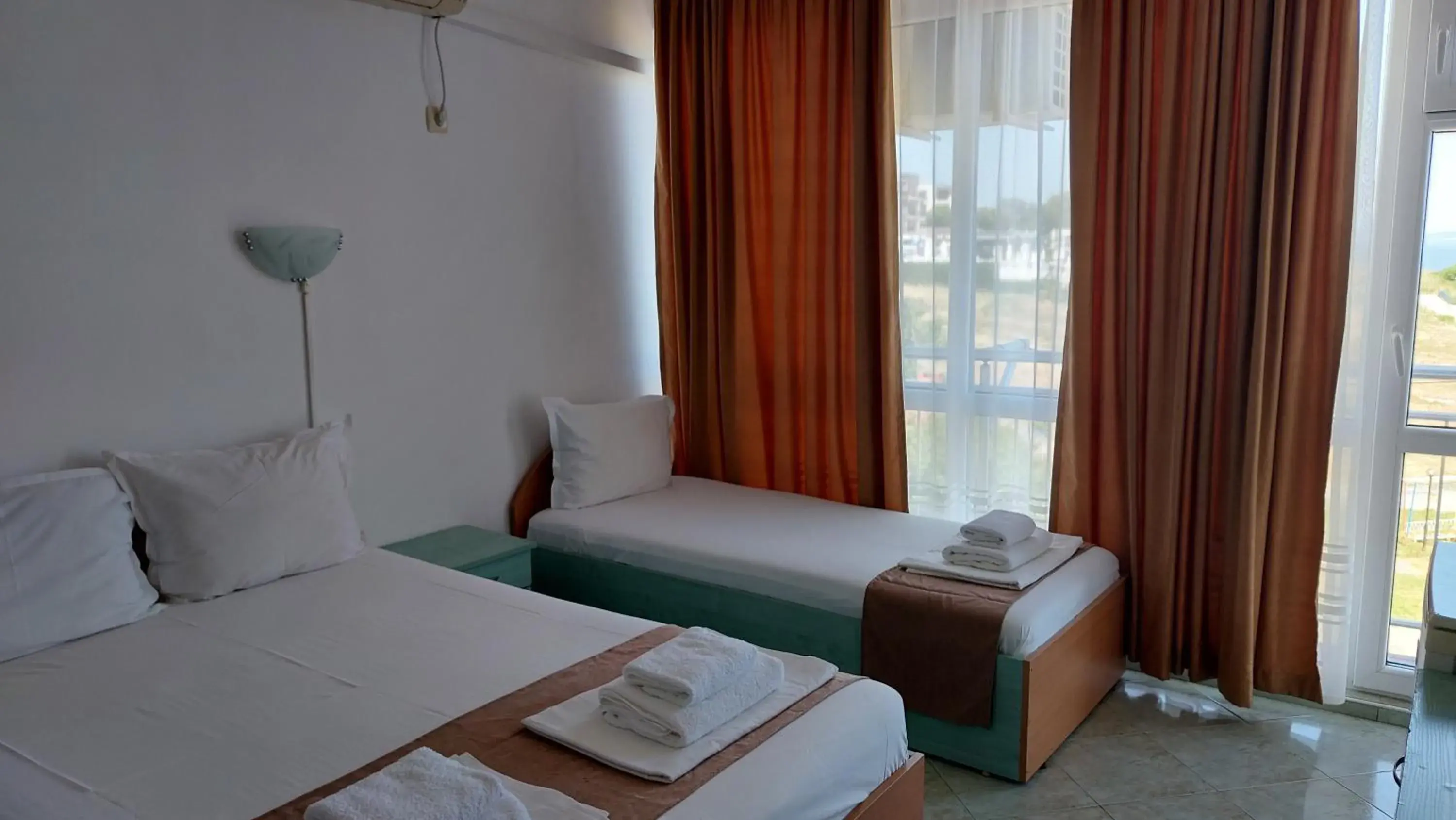 Triple Room with Balcony in Krai Moreto Guest House Triple Room with Balcony in Krai Moreto Guest House