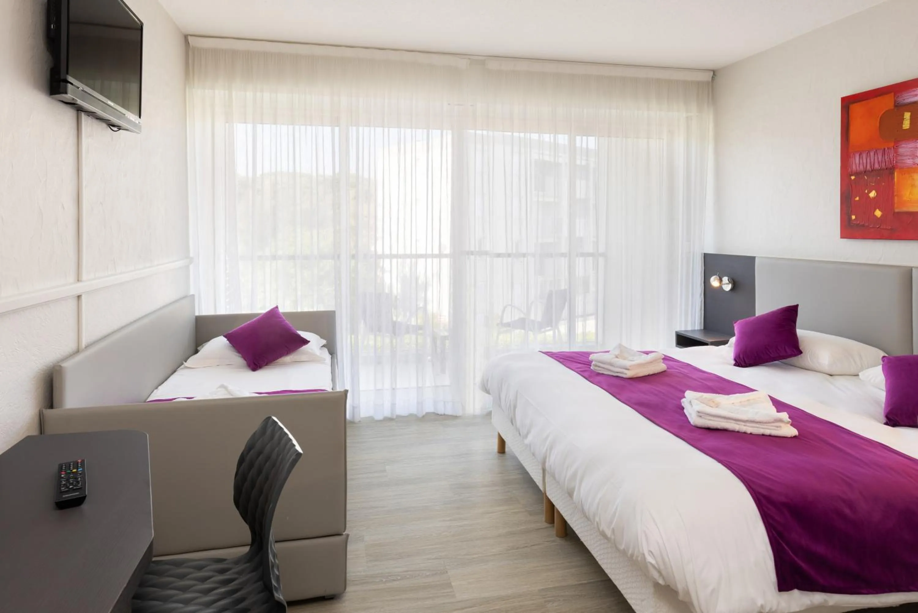 Bed in Hotel Club Le Capet