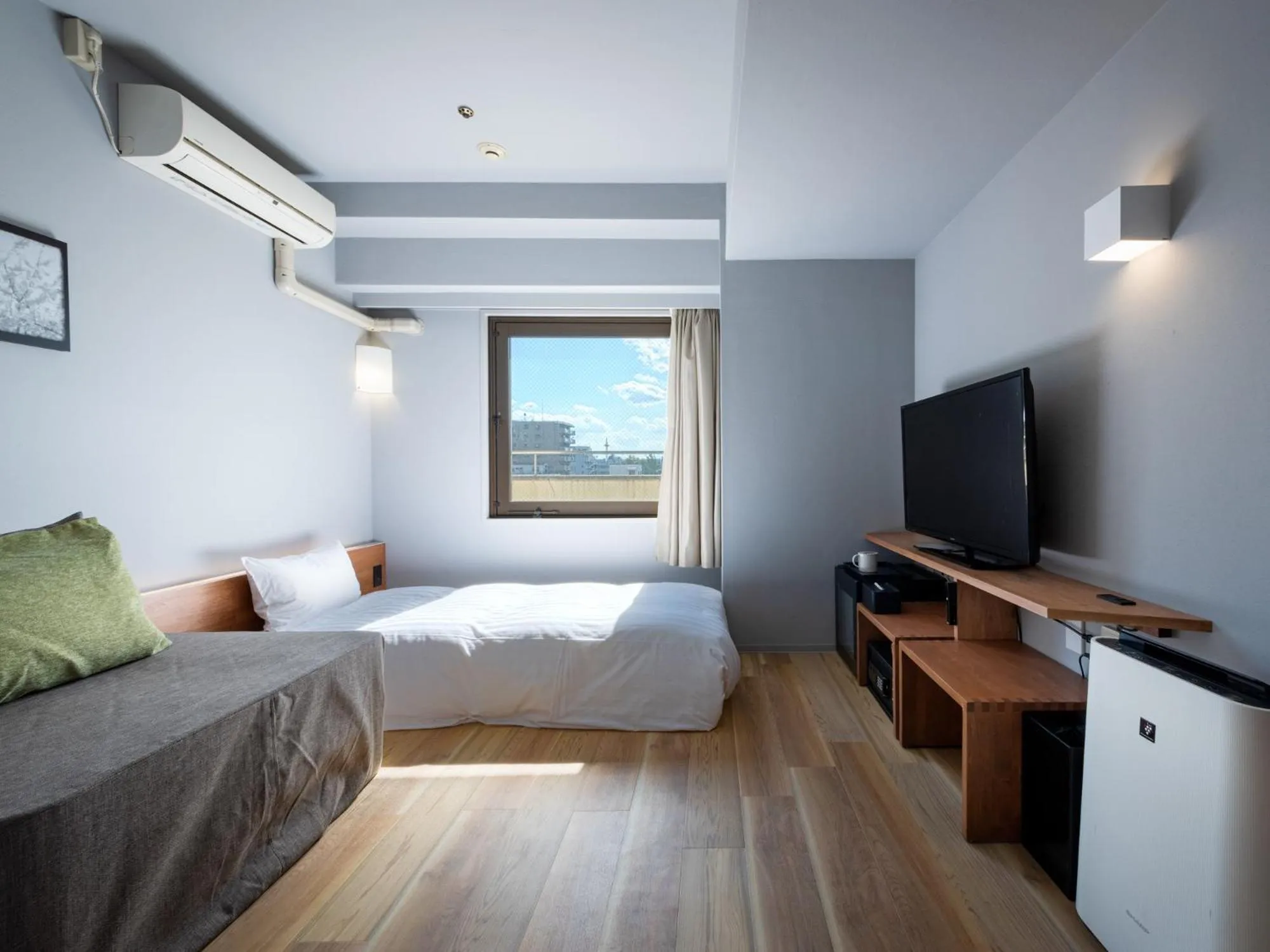 Bed in EN HOTEL Kyoto