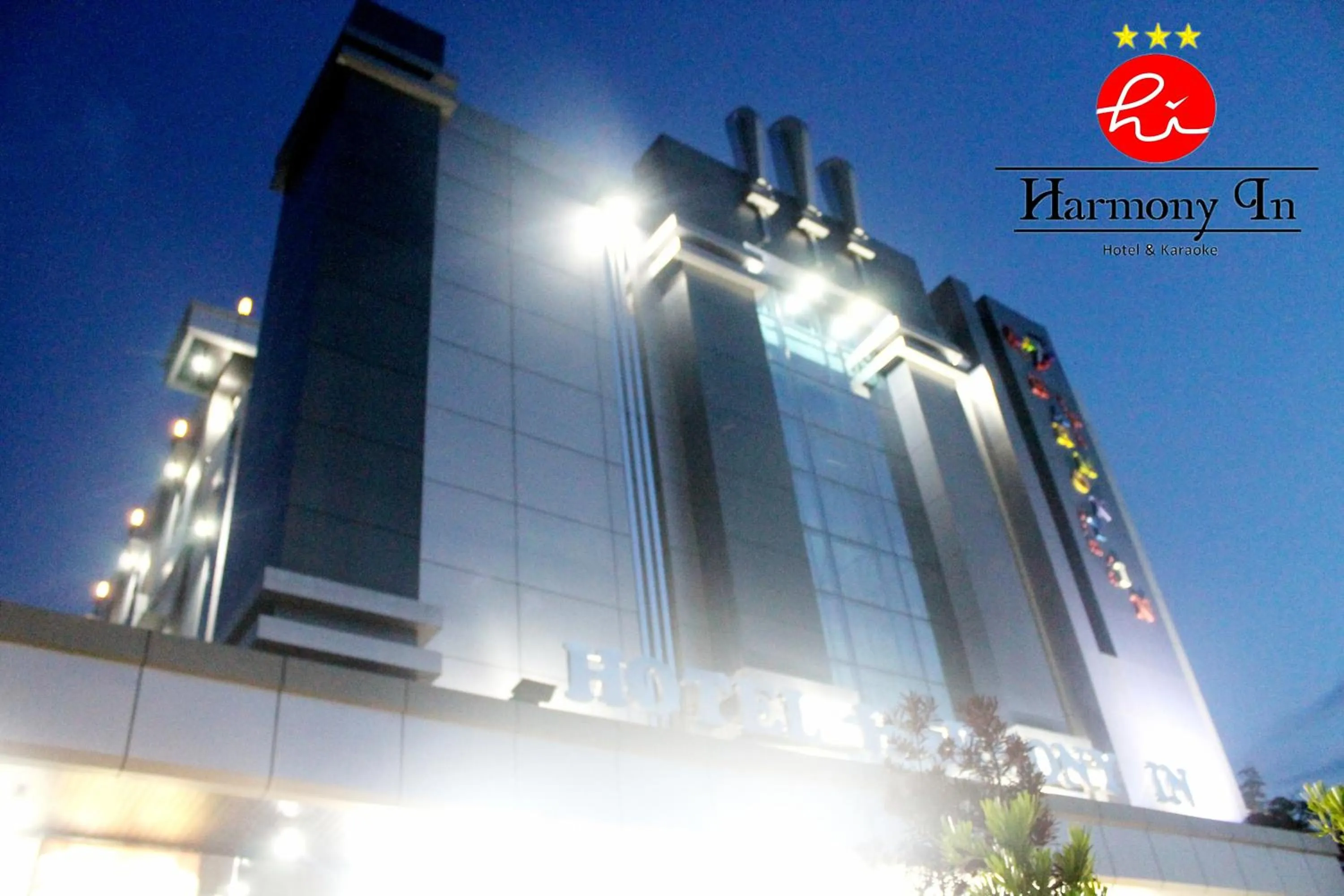 Property building in Hotel Harmony In & Karaoke