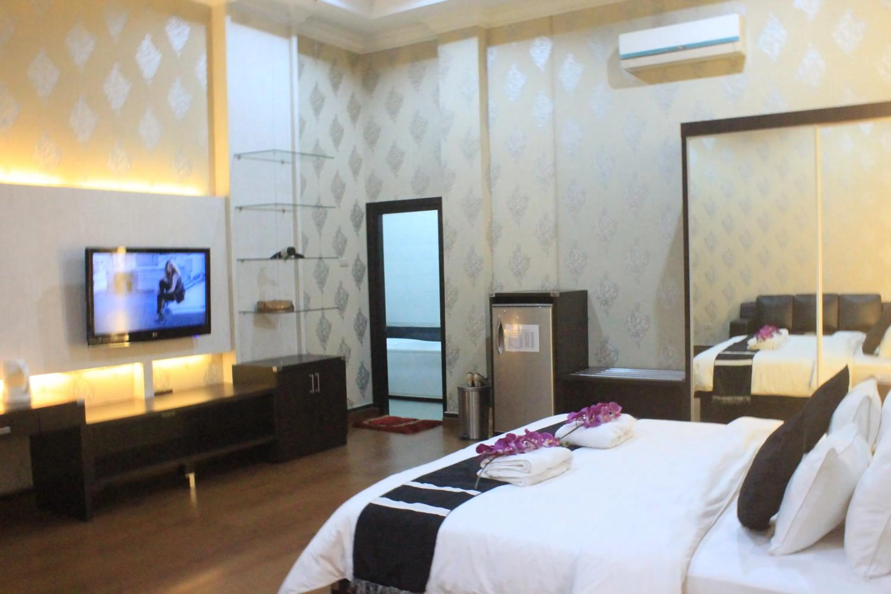 Bed in Hotel Harmony In & Karaoke