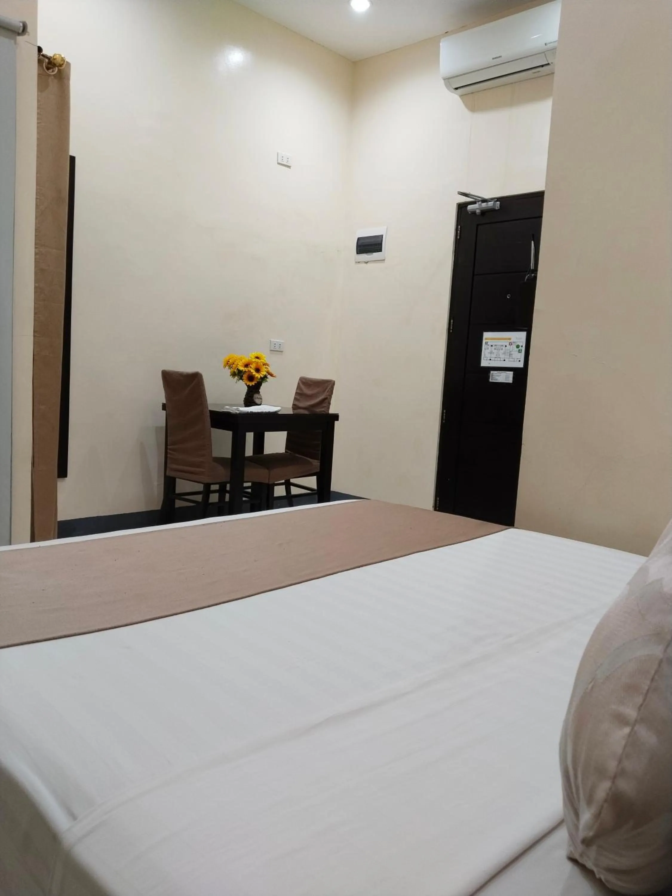 Seating area, Bed in Rosetta Guest House