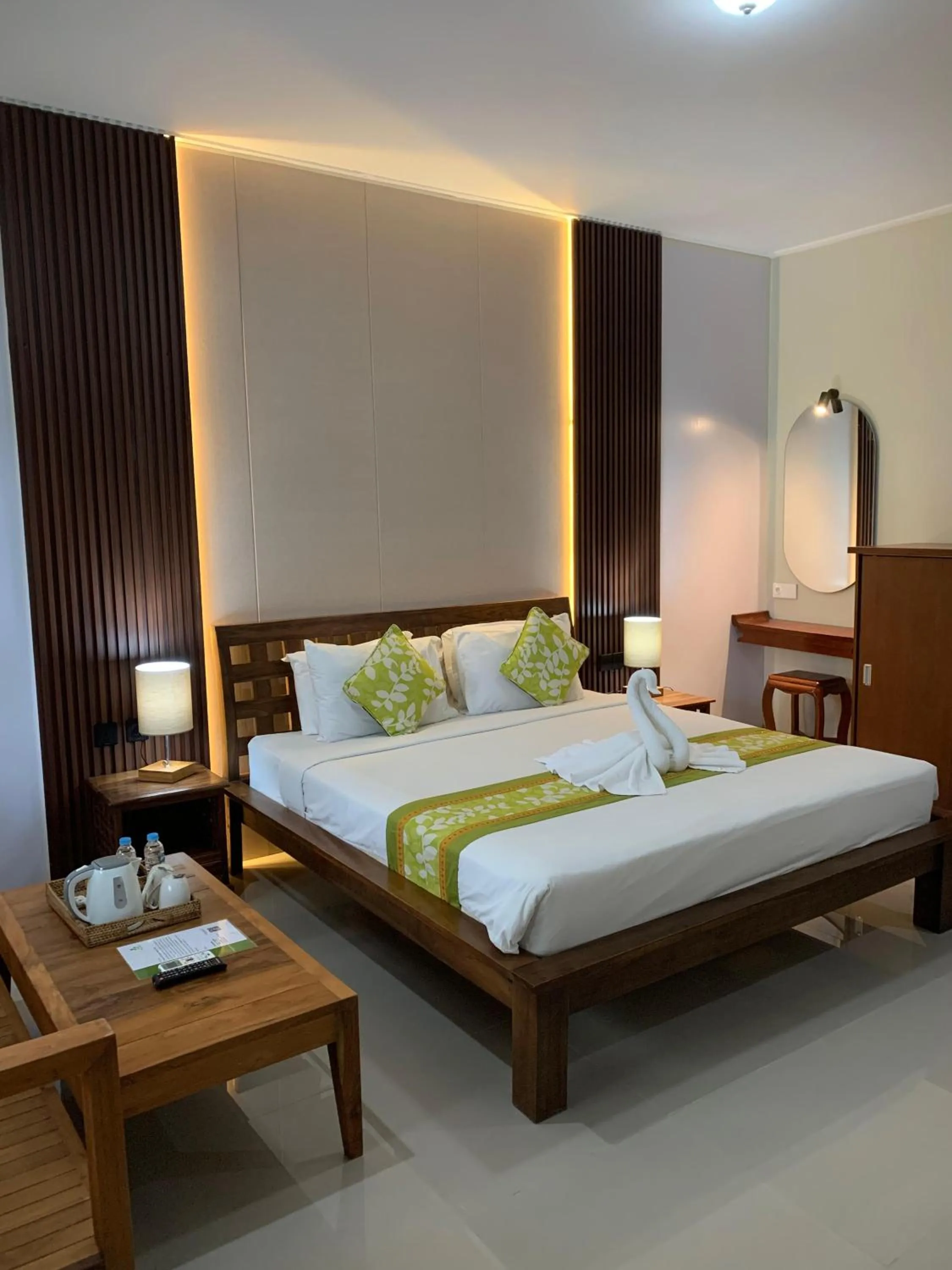 Bed in Three Brothers Bali Legian Bungalows & Villas