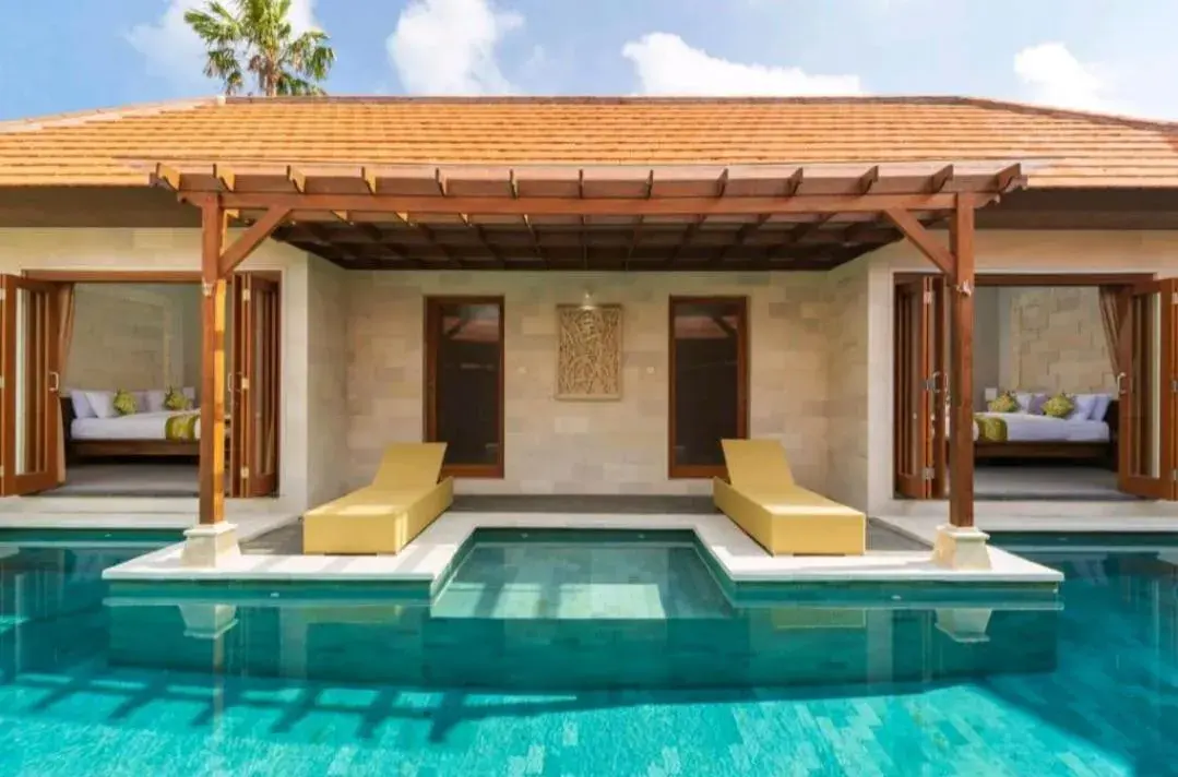 Pool view in Three Brothers Bali Legian Bungalows & Villas Pool view in Three Brothers Bali Legian Bungalows & Villas