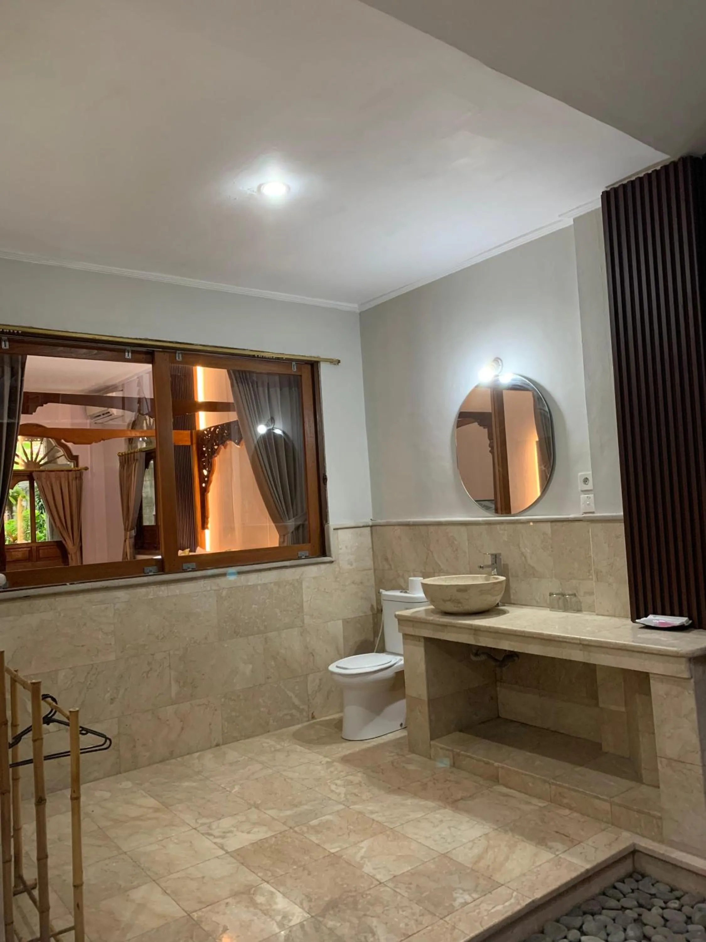 Bathroom in Three Brothers Bali Legian Bungalows & Villas