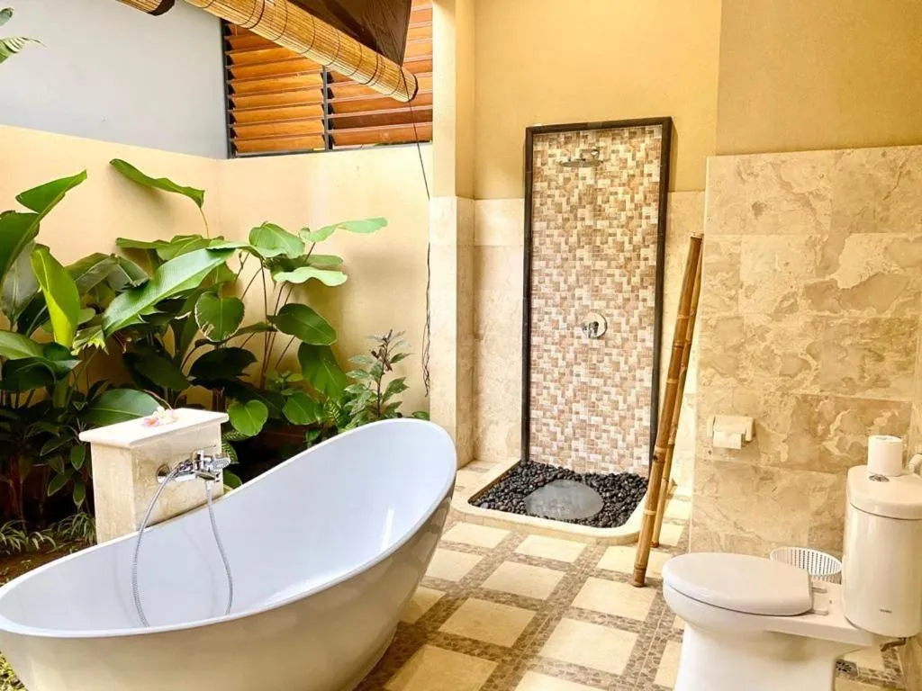 Shower in Three Brothers Bali Legian Bungalows & Villas