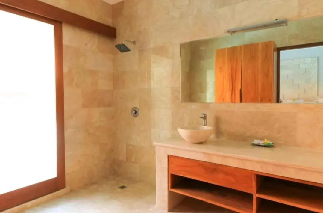 Shower in Three Brothers Bali Legian Bungalows & Villas Shower in Three Brothers Bali Legian Bungalows & Villas