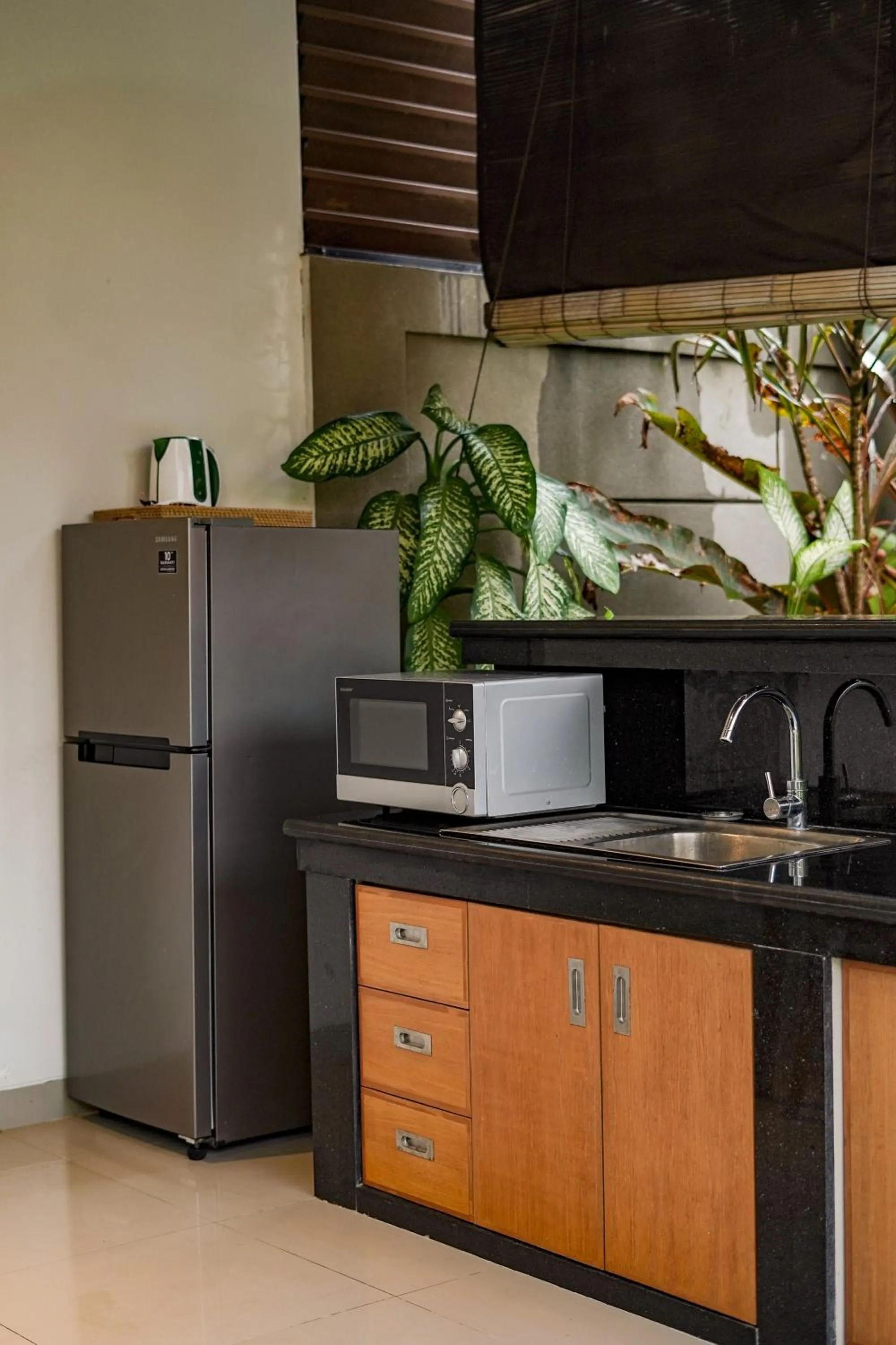 Kitchen or kitchenette in Three Brothers Bali Legian Bungalows & Villas