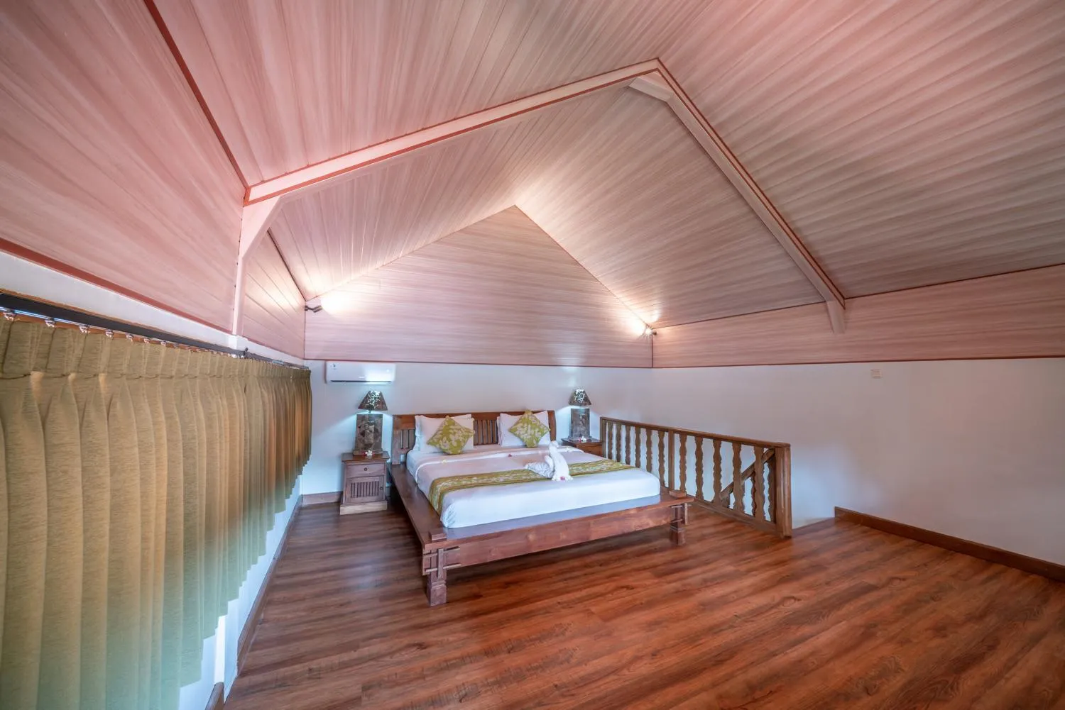 Bed in Three Brothers Bali Legian Bungalows & Villas