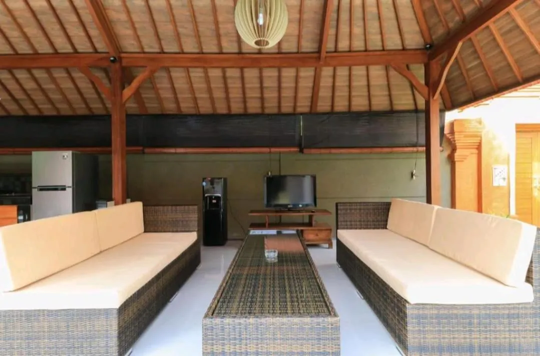 Communal lounge/ TV room in Three Brothers Bali Legian Bungalows & Villas