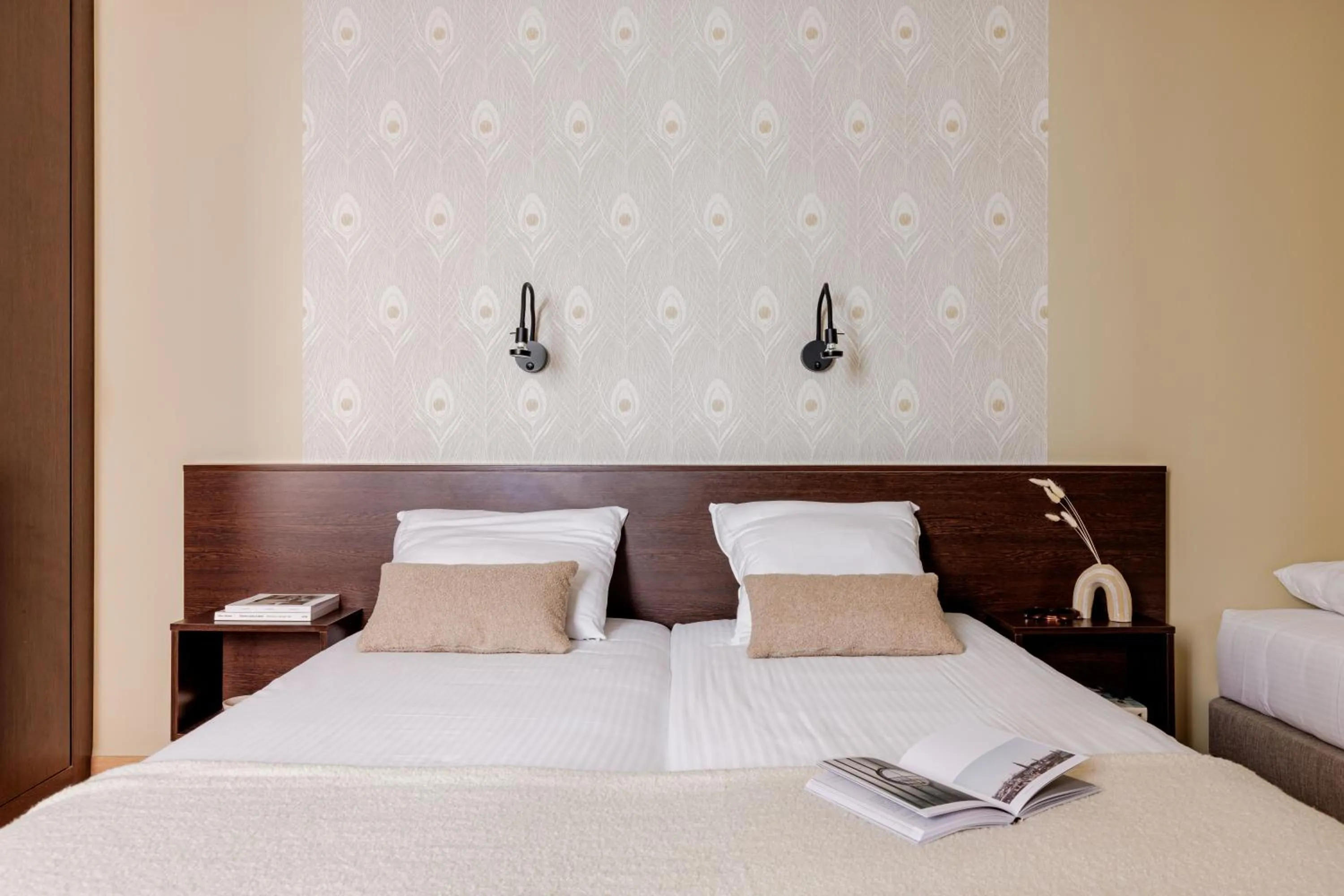 Bed in Hotel Corner House by WP Hotels