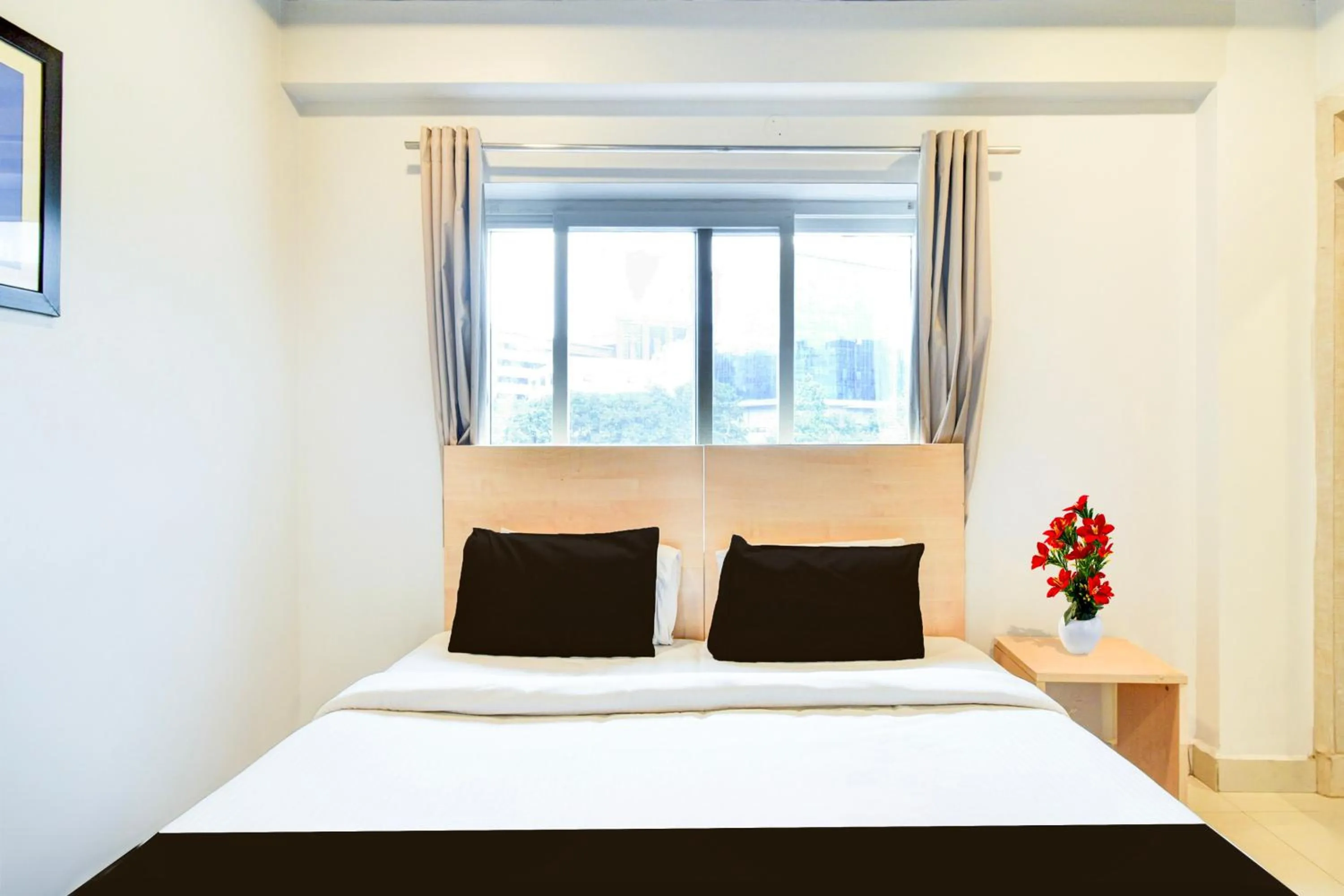 Bedroom, Bed in Super Townhouse Hi Tech City Hyderabad