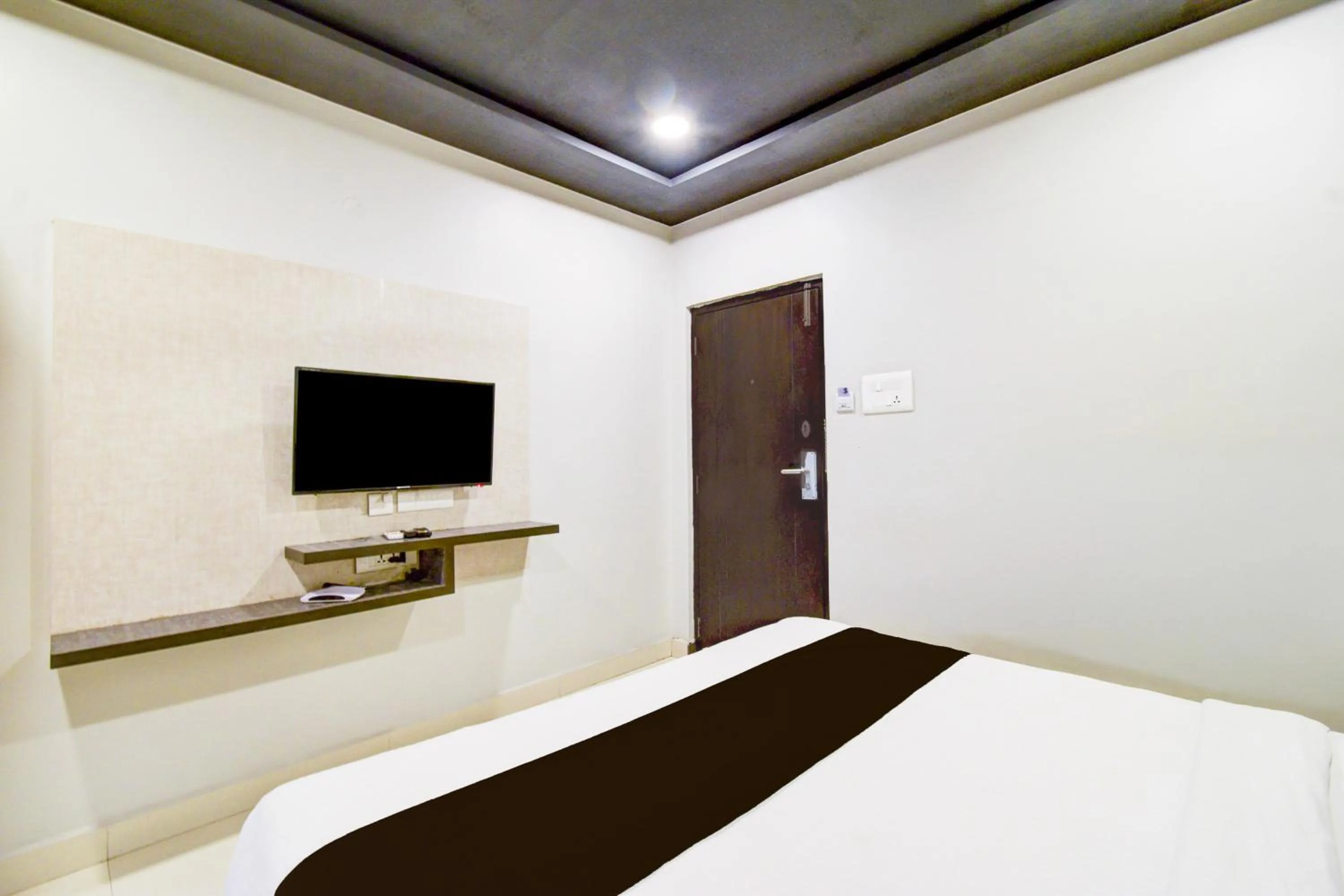 Bedroom, Bed in Super Townhouse Hi Tech City Hyderabad