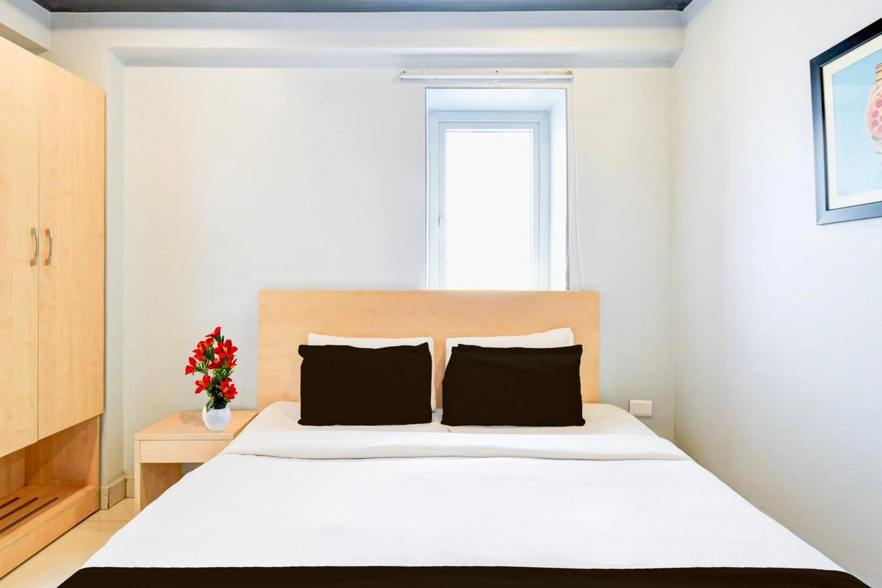 Bedroom, Bed in Super Townhouse Hi Tech City Hyderabad