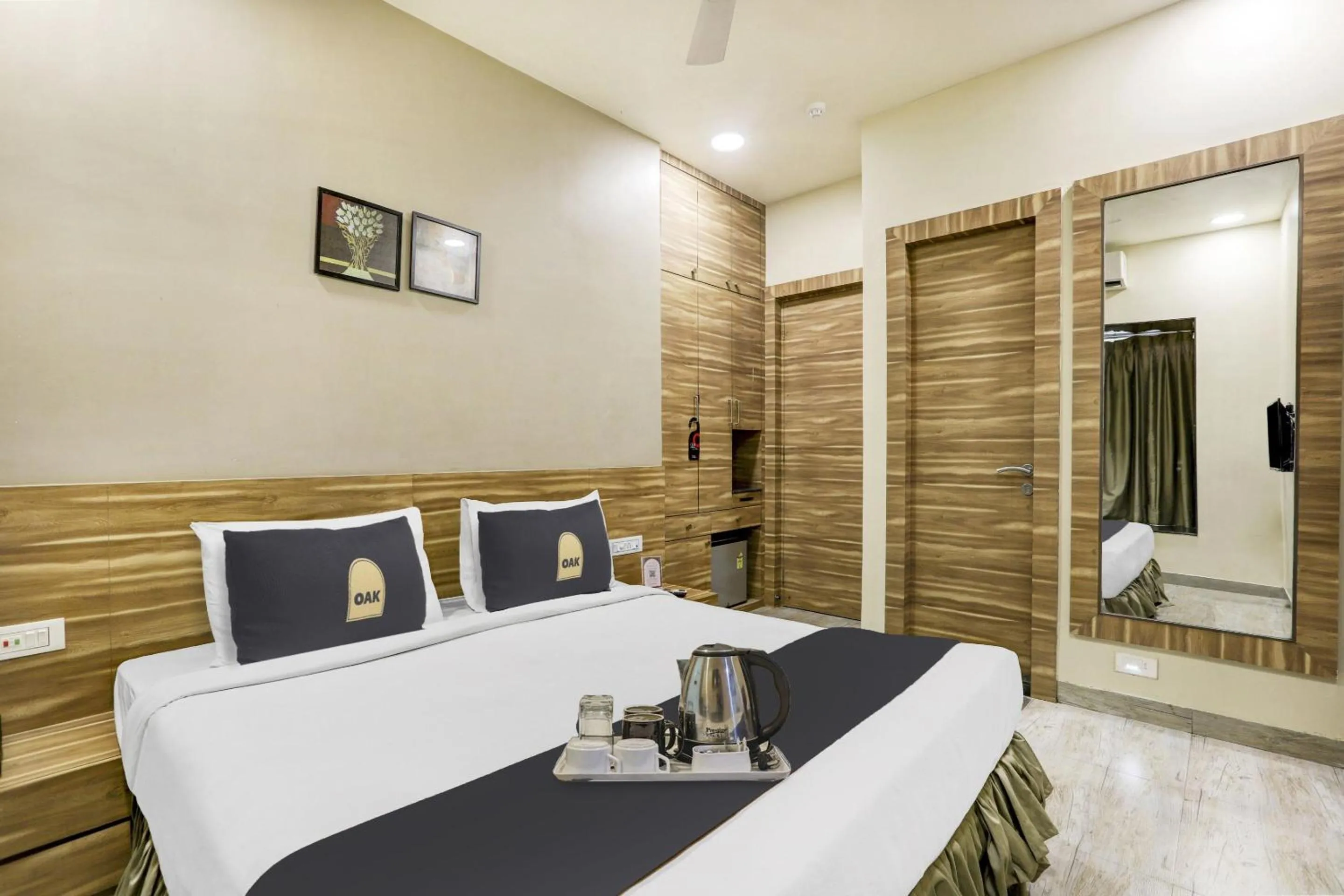 Bedroom in Super Townhouse OAK Shubhham Regency