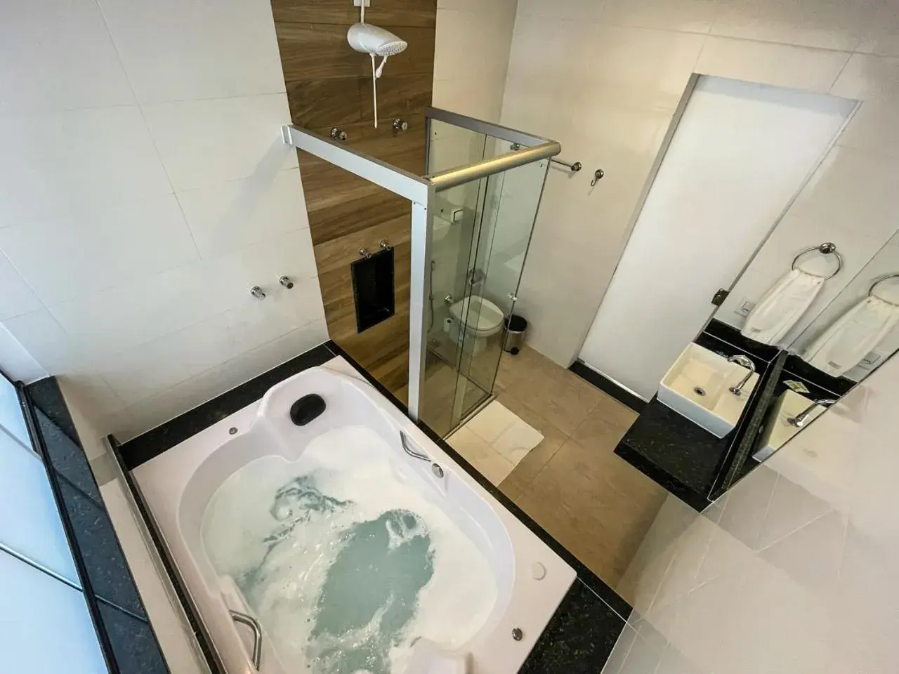 Triple Room with Bath in Pousada Capitólio Triple Room with Bath in Pousada Capitólio