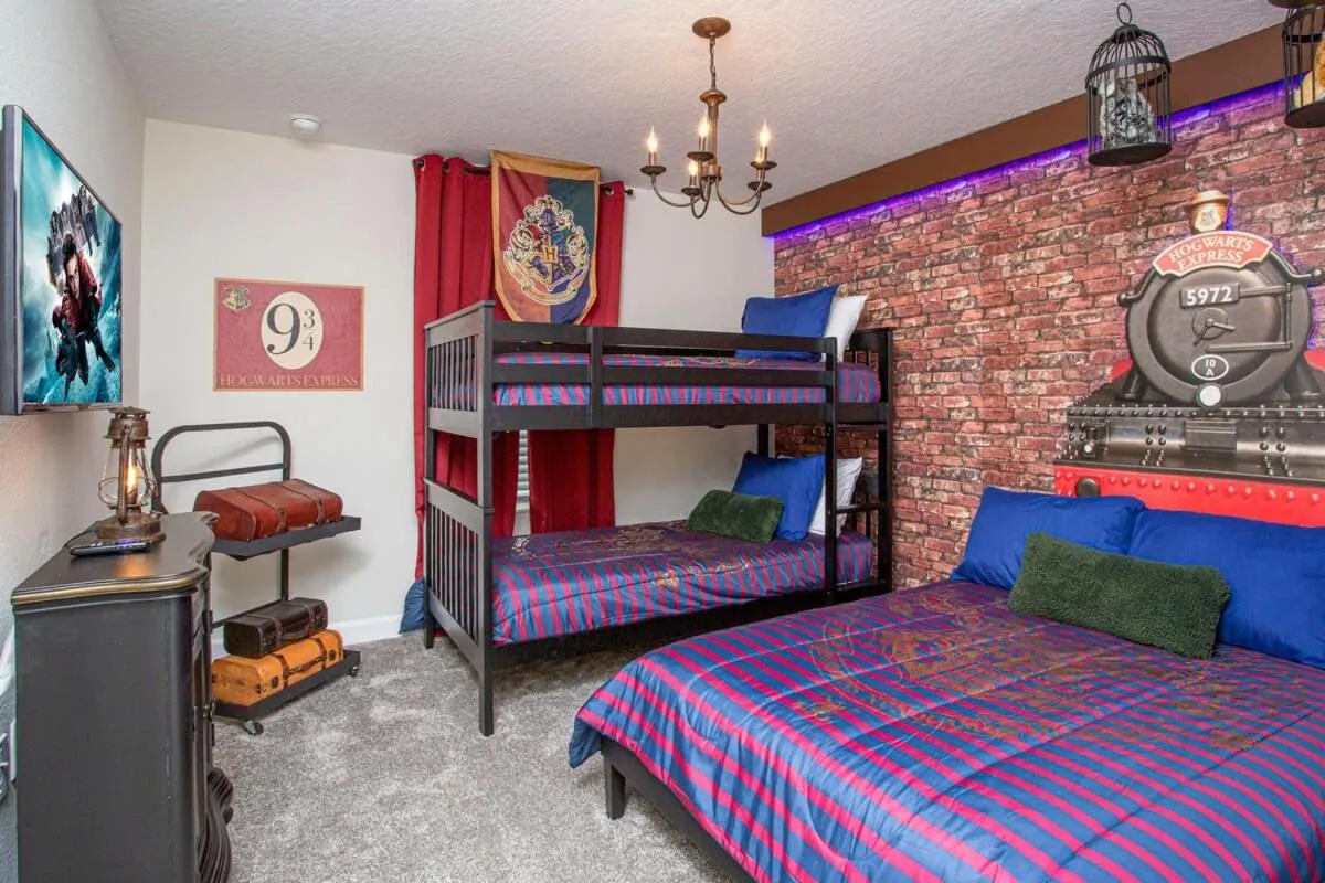 Bed in Gorgeous 4 Bedroom w/ Pool Close to Disney 4836