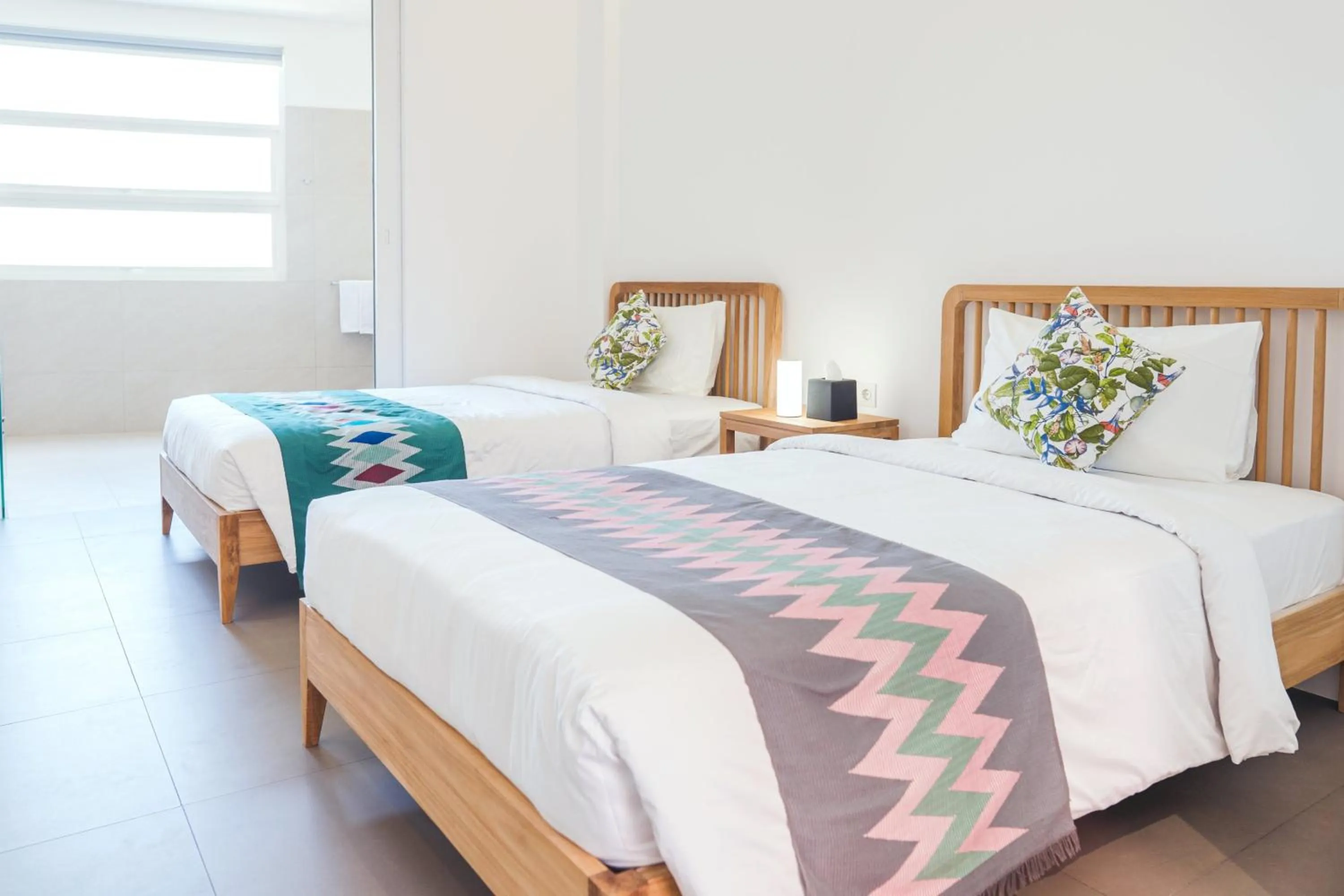 Bed in K Gallery Hotel